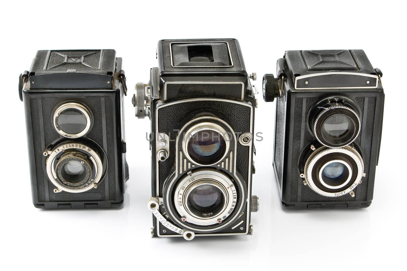 Three Vintage two lens photo camera isolated on white