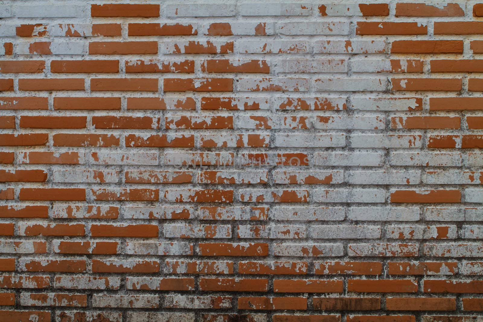 Old Wall from a red brick by thanomphong