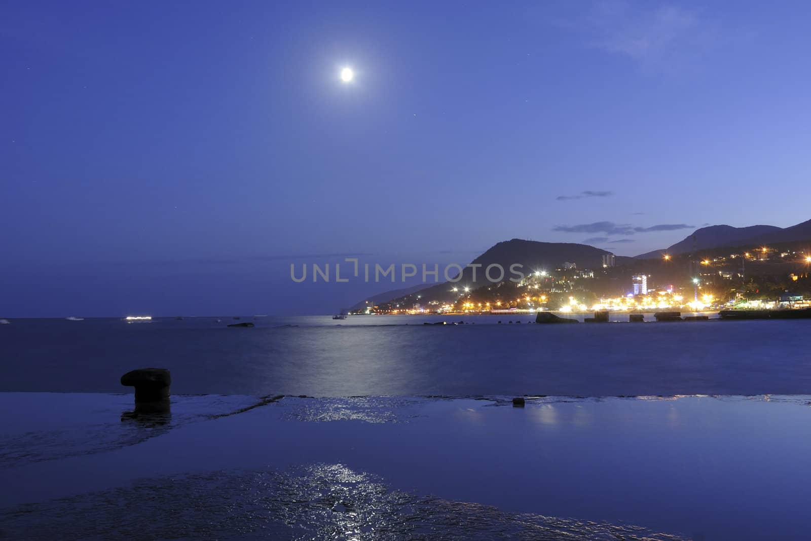 moon rising over Black sea in place of Alushta city in Crimea, Ukraine