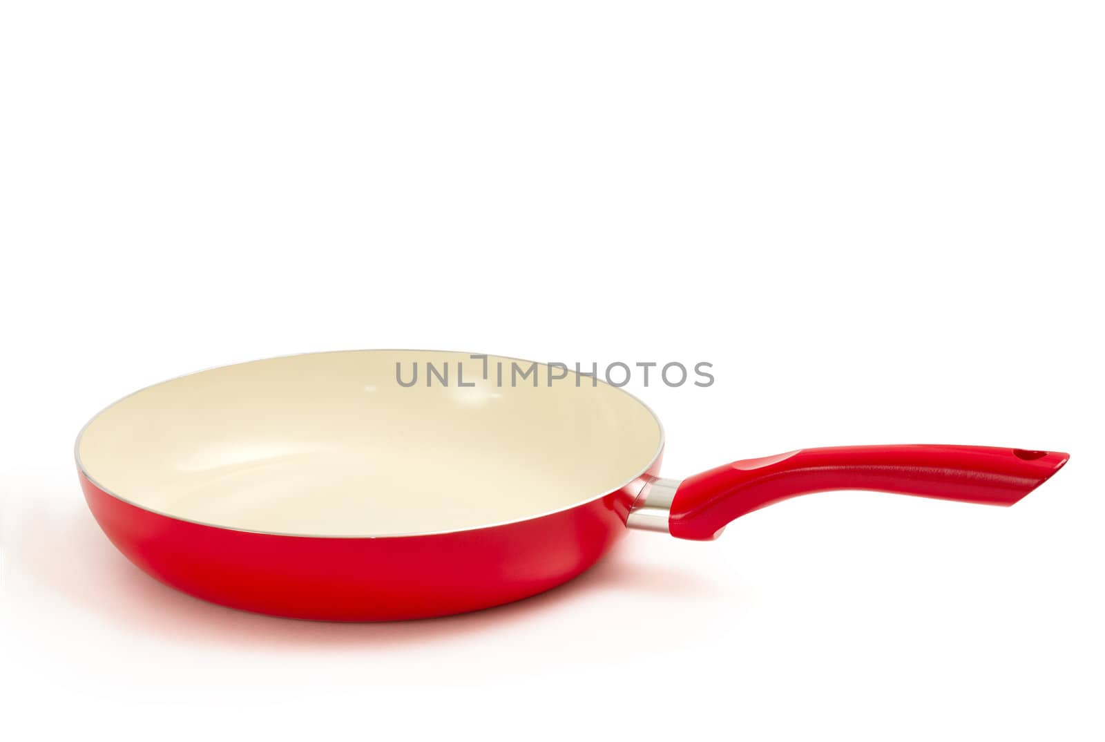 Frying pan with ceramic isolated on white background