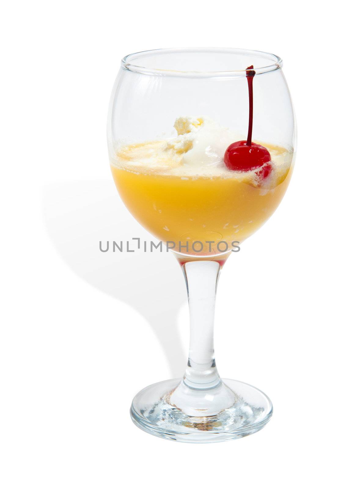 ice cream with orange juice in a glass isolated on white background