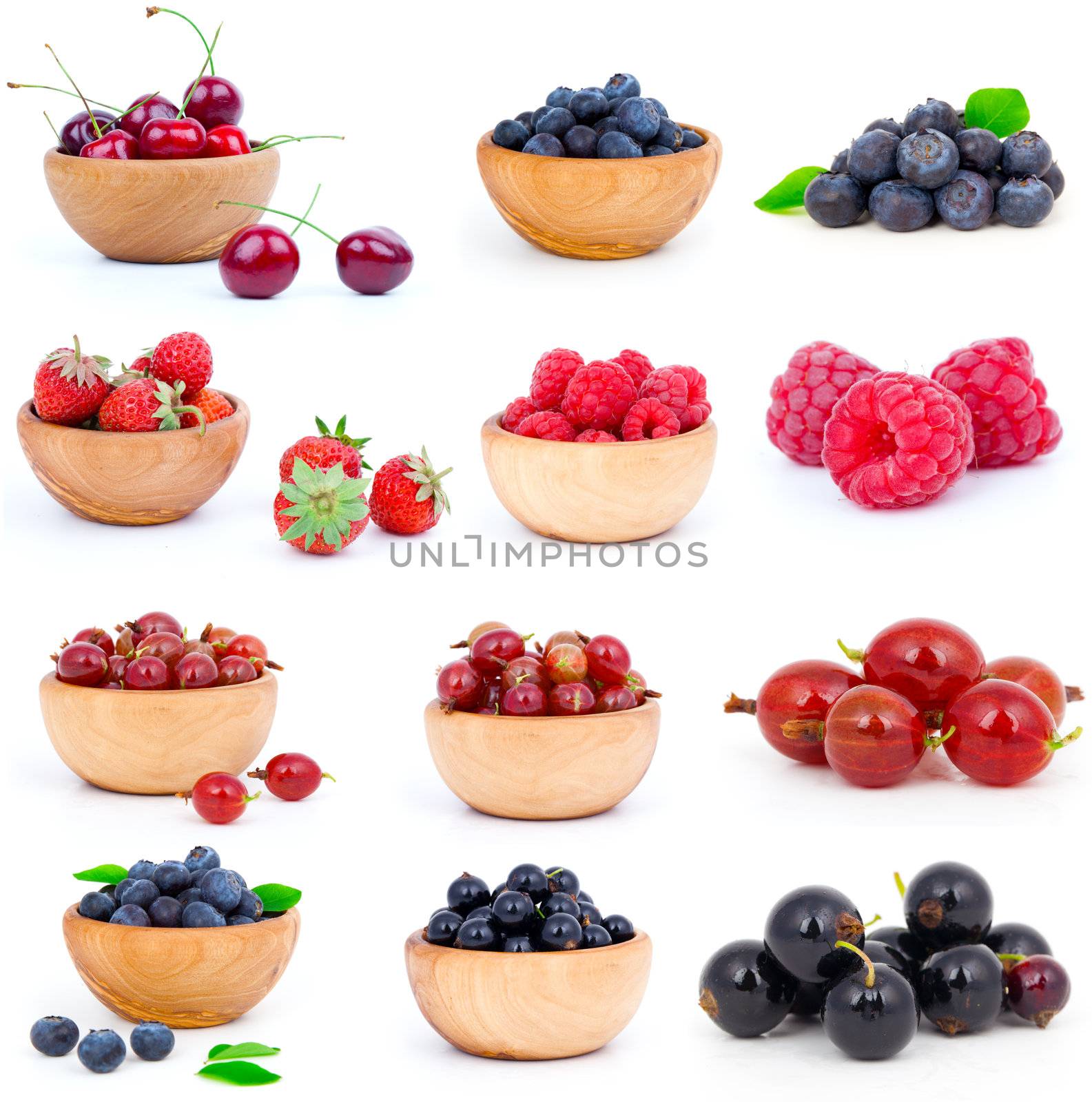 set of fresh strawberry, Blueberries, Raspberries, cherry, gooseberries and blackcurrants in a wooden bowl, over a white background. by motorolka