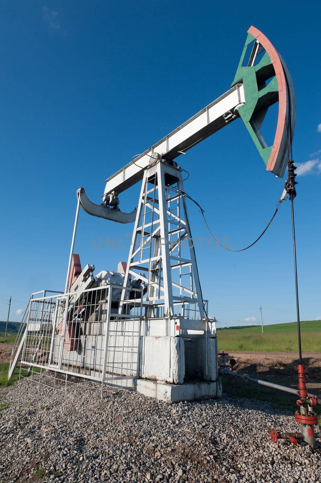 Oil pump on a green field