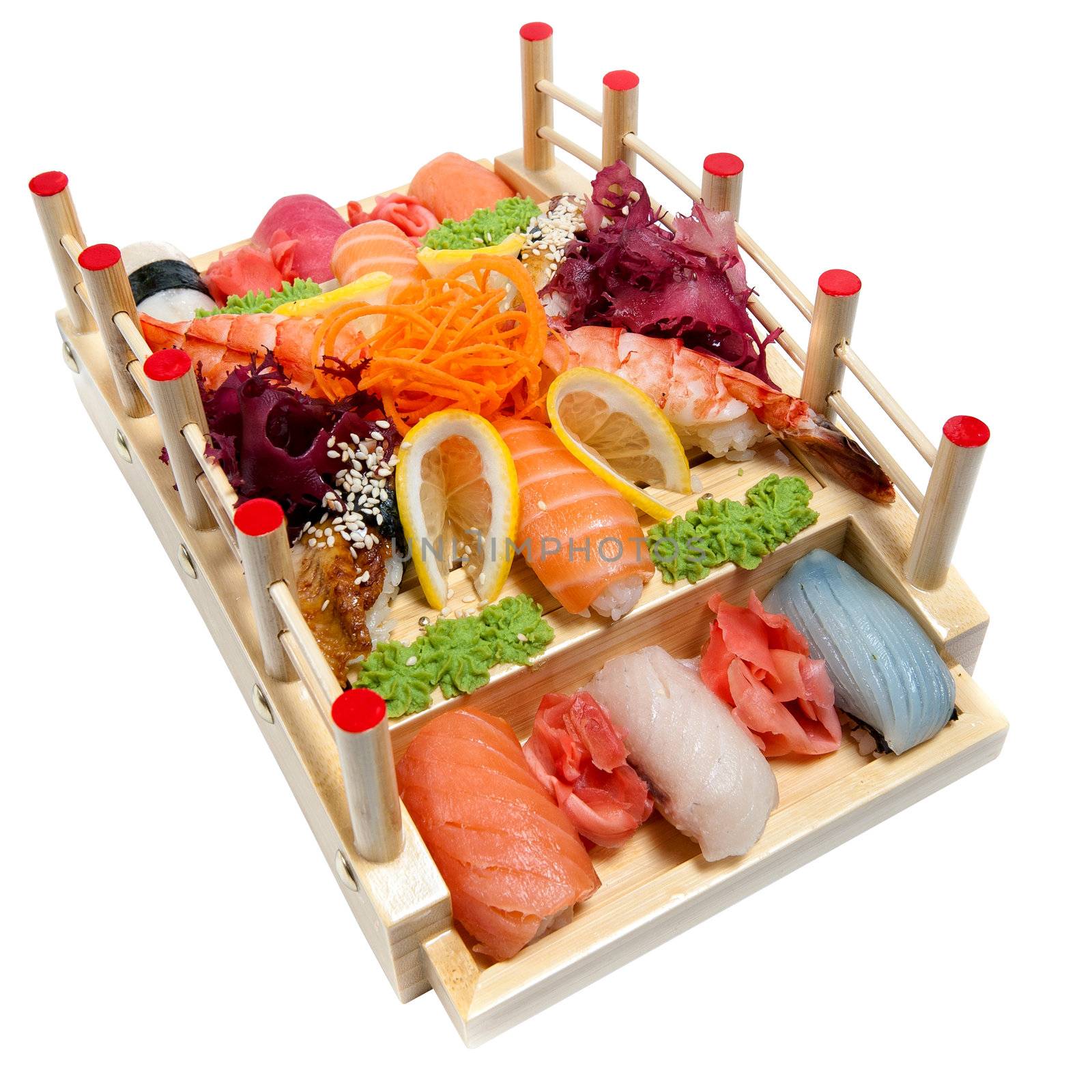 Set of sushi on wooden stand in the form of the bridge isolated on white