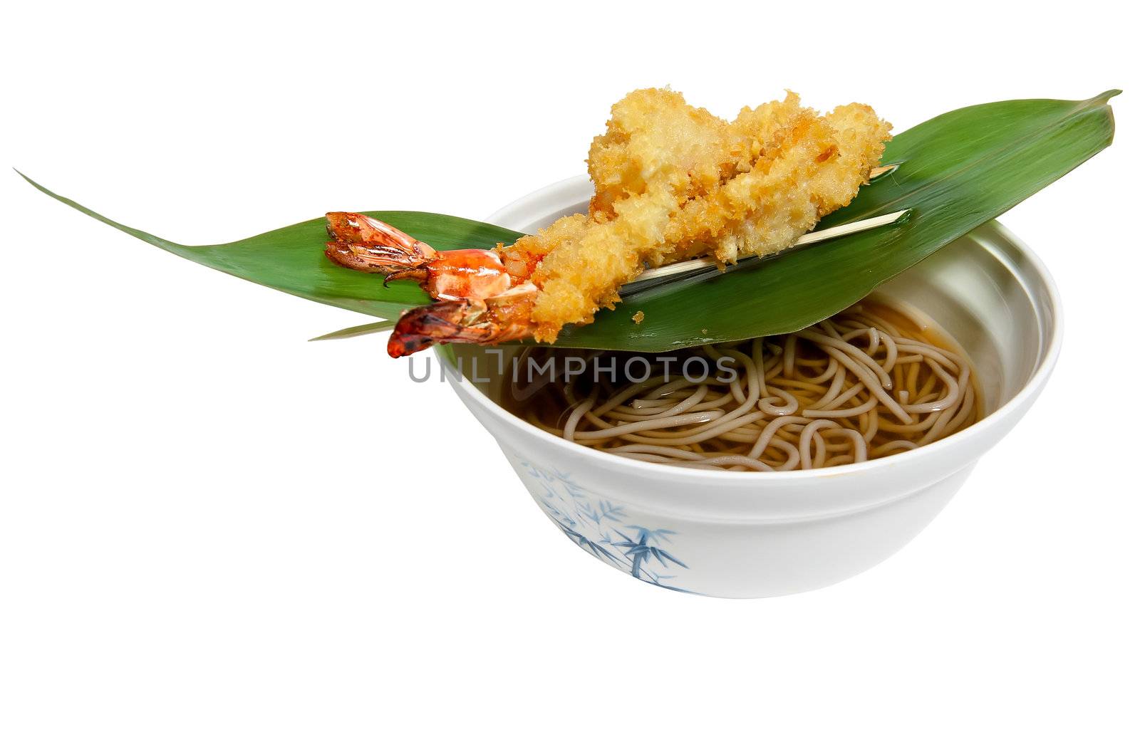 noodles made ​​of buckwheat flour and fried shrimp isolated on white