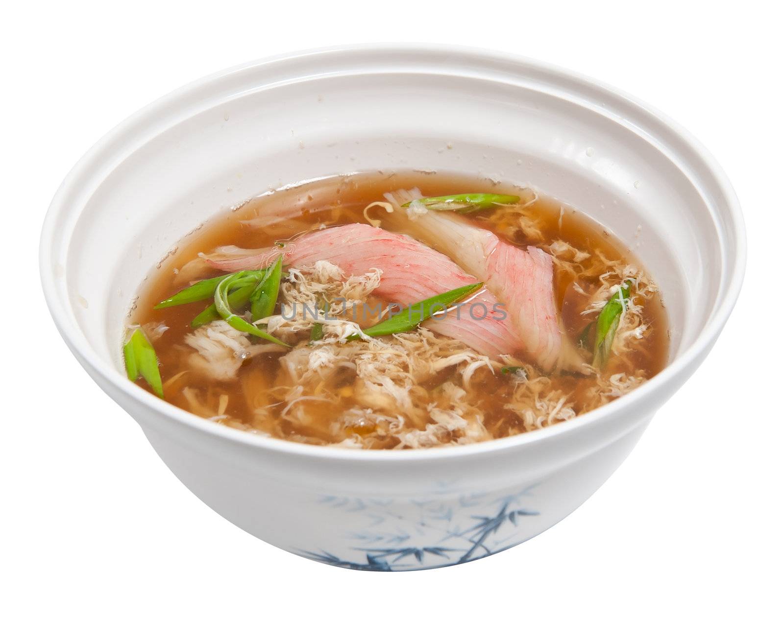 Japanese soup with crab meat and eggs isolated on white background