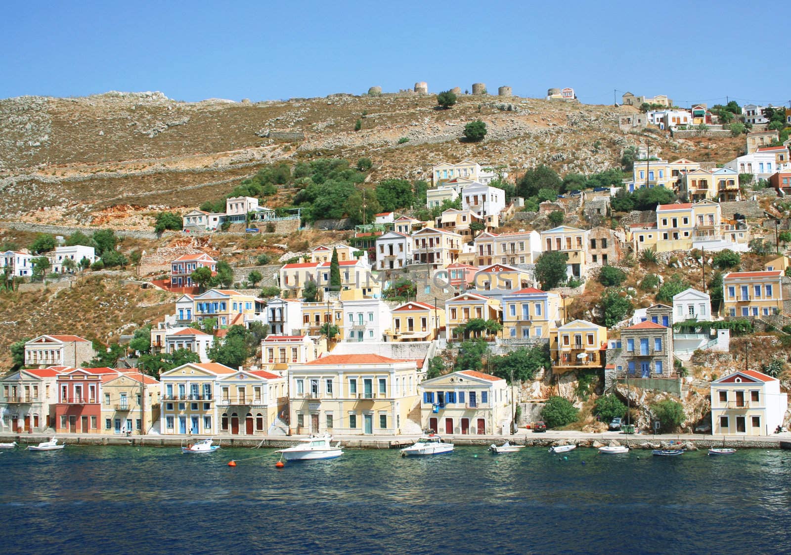Greece. Dodecanesse. Island Symi (Simi). Colorful houses 
