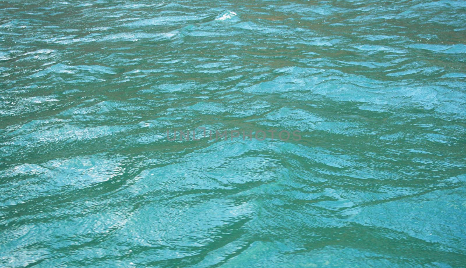 Azure sea water surface with ripple can use as background 
