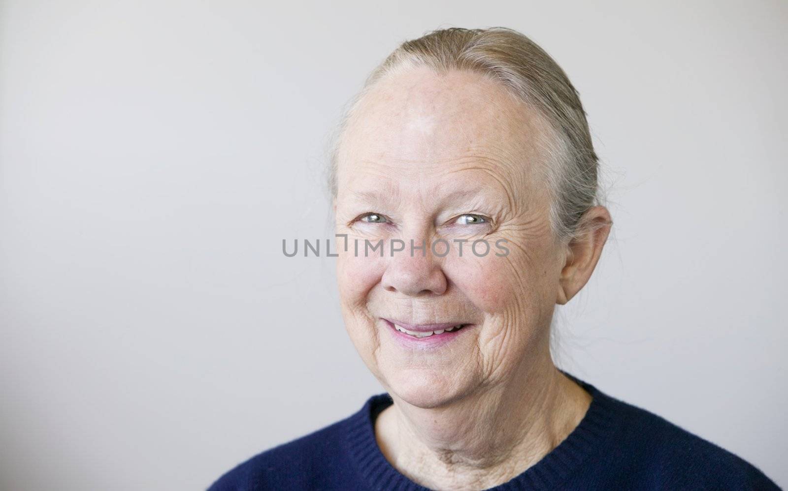 Portrait of a senior woman looking towards the camera.