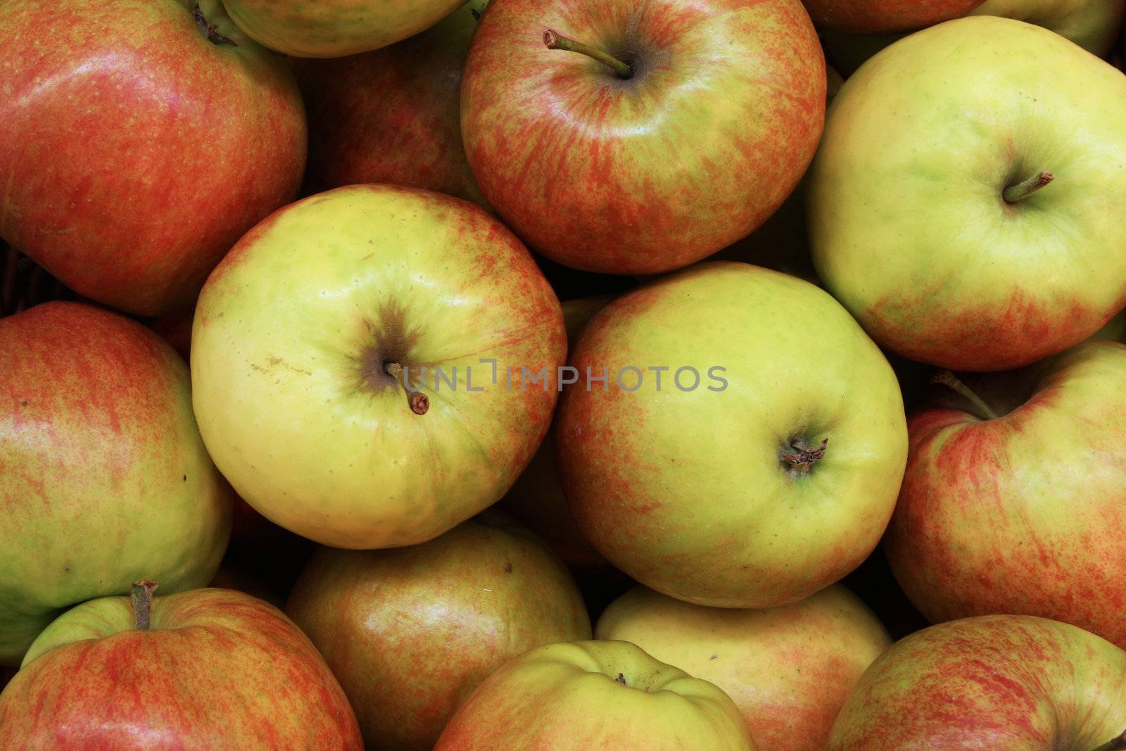 A pile of sweet apples at a farmers market