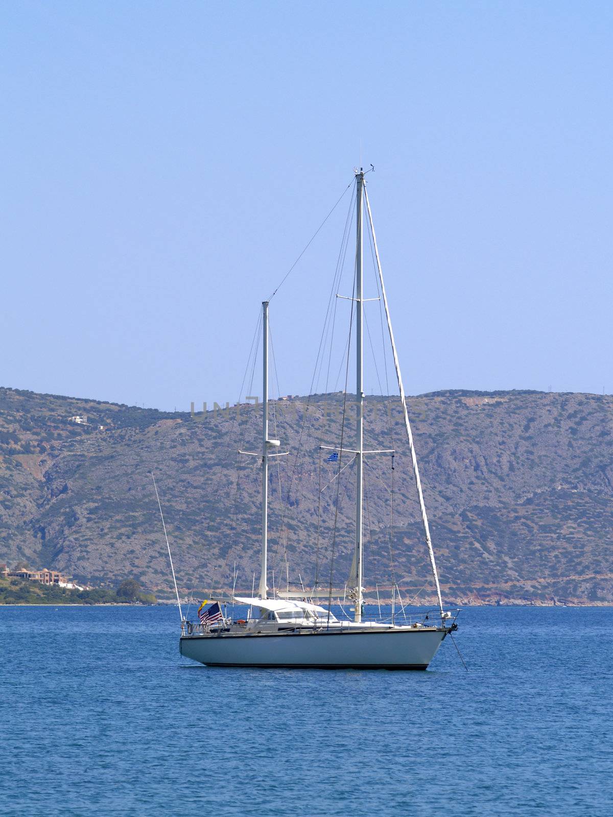 sailing yacht at the cretan coast