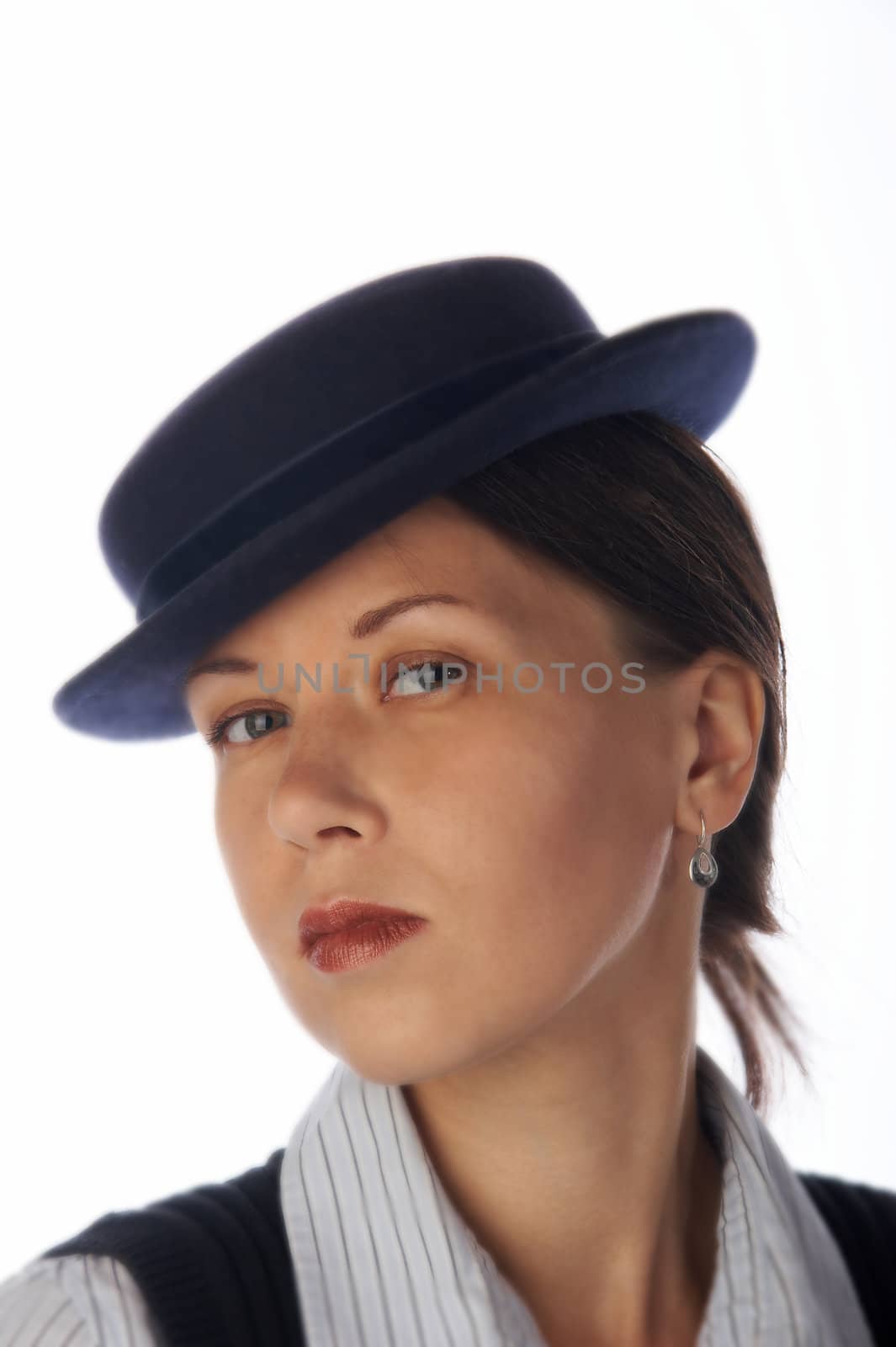 Young dark haired woman in 30's style hat