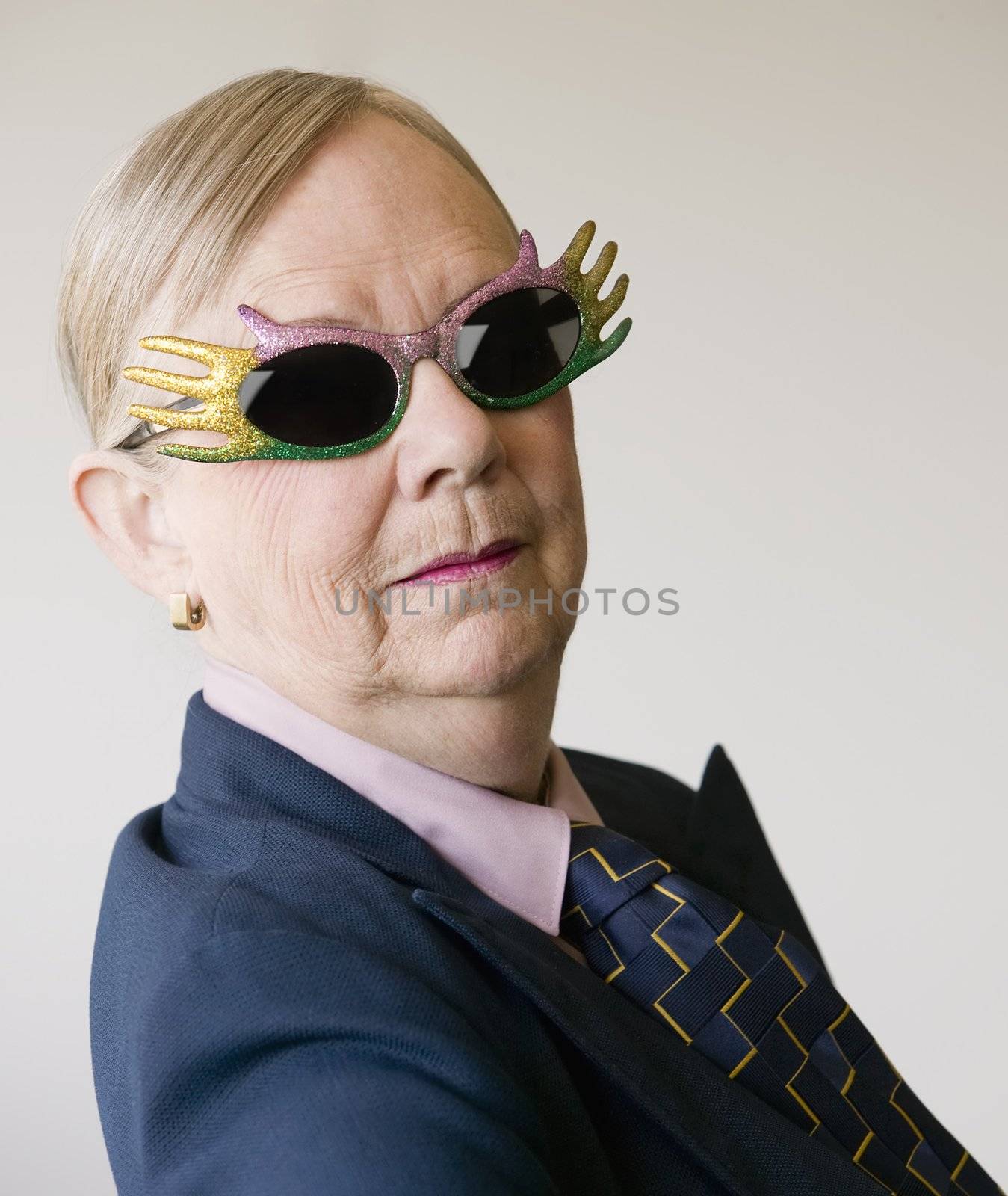 Dramatic Senior Woman Wearing Funny Glasses by Creatista