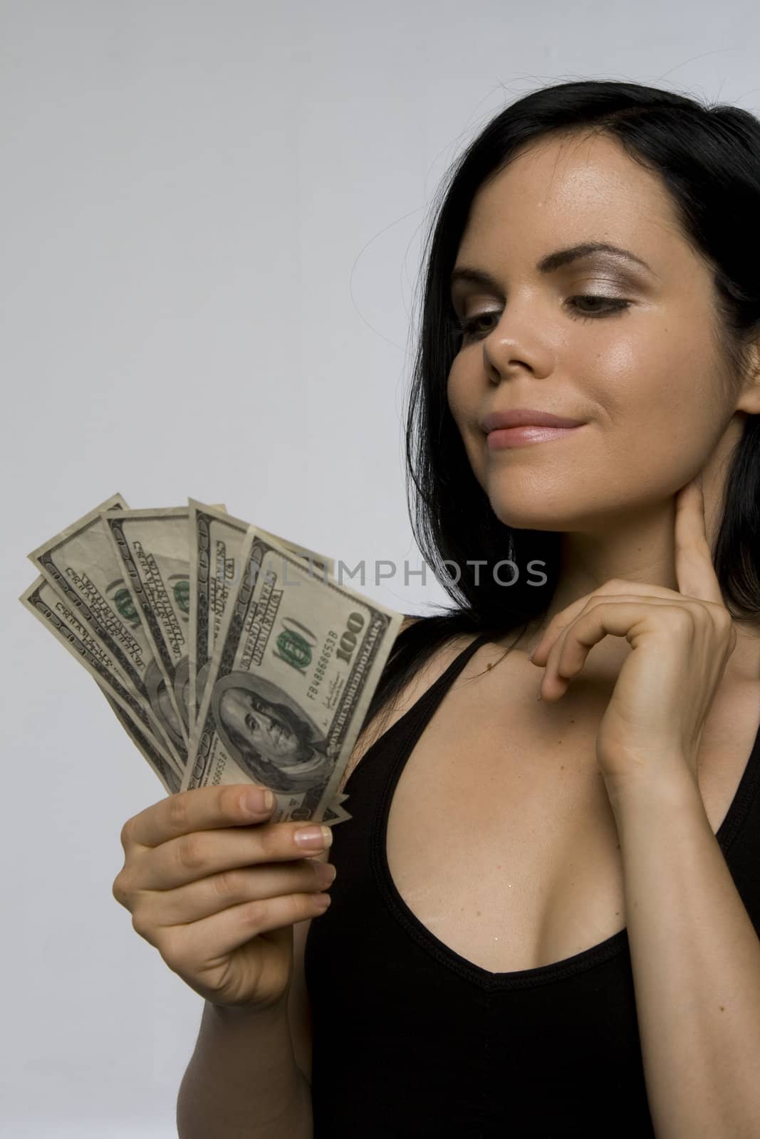 Woman with hundred-dollar bills. 