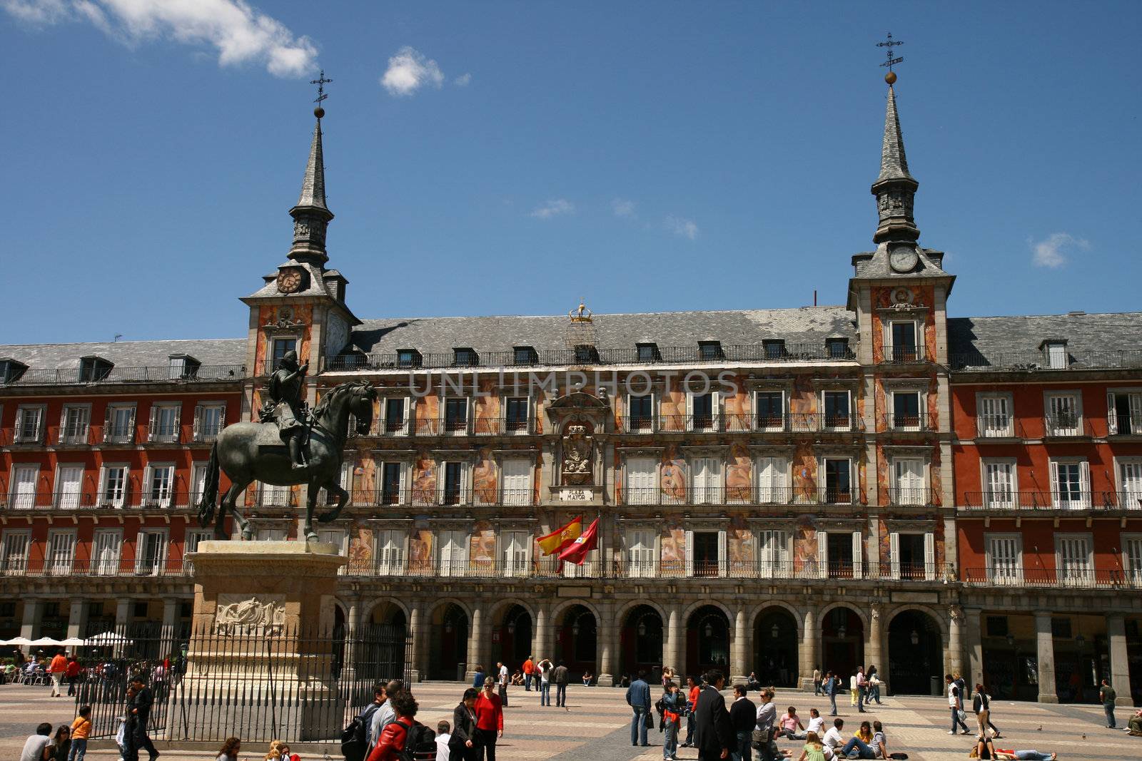 Plaza Mayor, at the heart of Madrid's historic downtown.
The Plaza Mayor has been the scene of many events from markets, bullfights, soccer games, public executions, and, during the Spanish Inquistion, "autos de fe" against supposed heretics and the executions of those condemned to death. The Plaza Mayor also has a ring of old and traditional shops and cafes under its porticoes. Celebrations for San Isidro, patron saint of Madrid, are also held here. The Plaza Mayor is now a major tourist attraction, visited by thousands of tourists a year