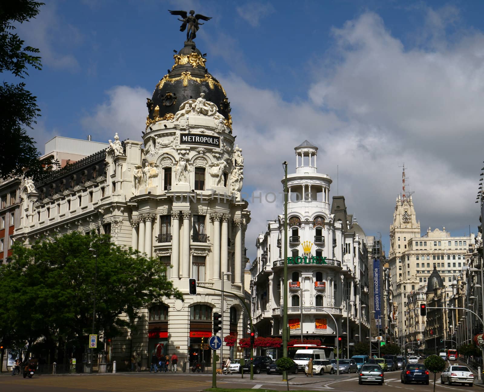 The Edificio Metrópolis or Metropolis building at the entrance of the Gran Vía, one of Madrid's major boulevards. The landmark was built between 1907 and 1911 after a design by the architects Jules & Raymond Février. The original statue was replaced in 1975 by a statue of a winged Goddess Victory.