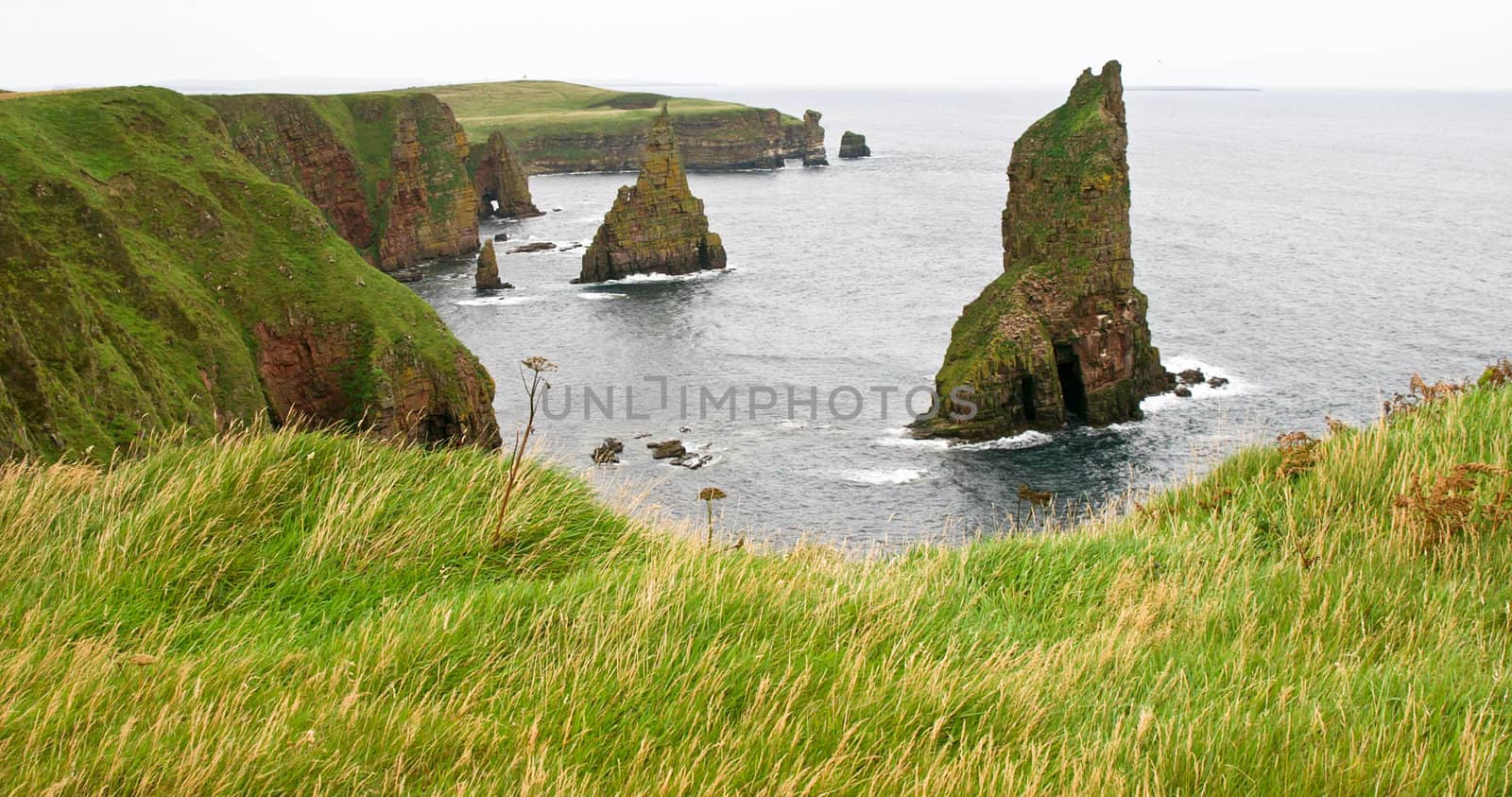 viewpoint on duncansby head scotland towards several sea stacks