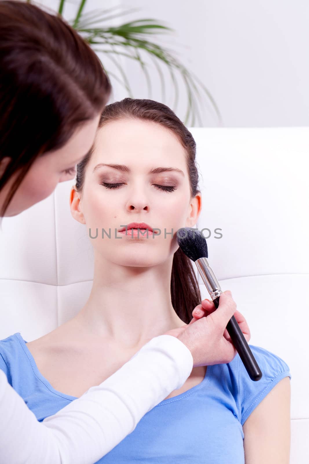 attractive woman powder face make up cosmetic beauty salon