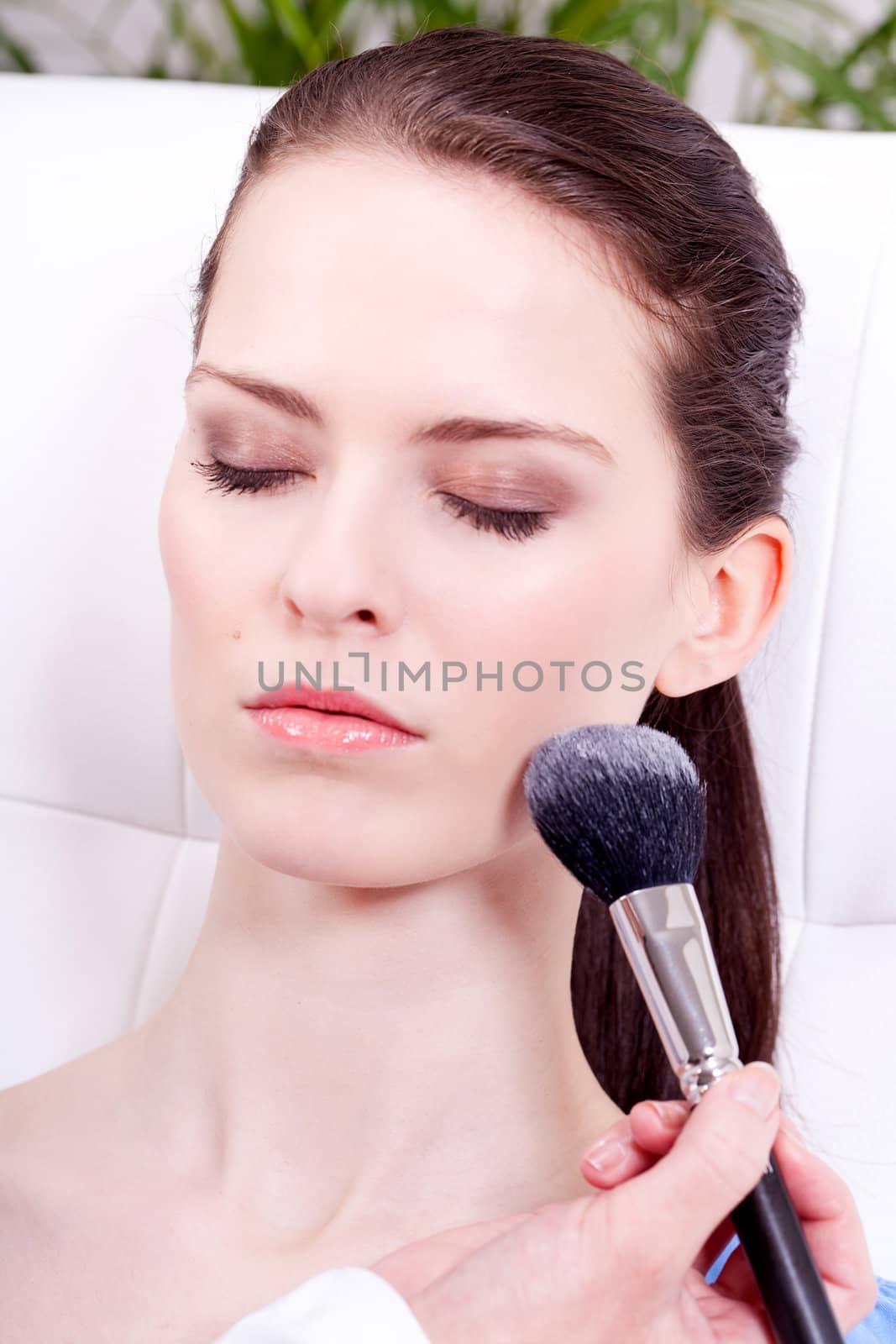 attractive woman powder face make up cosmetic beauty salon