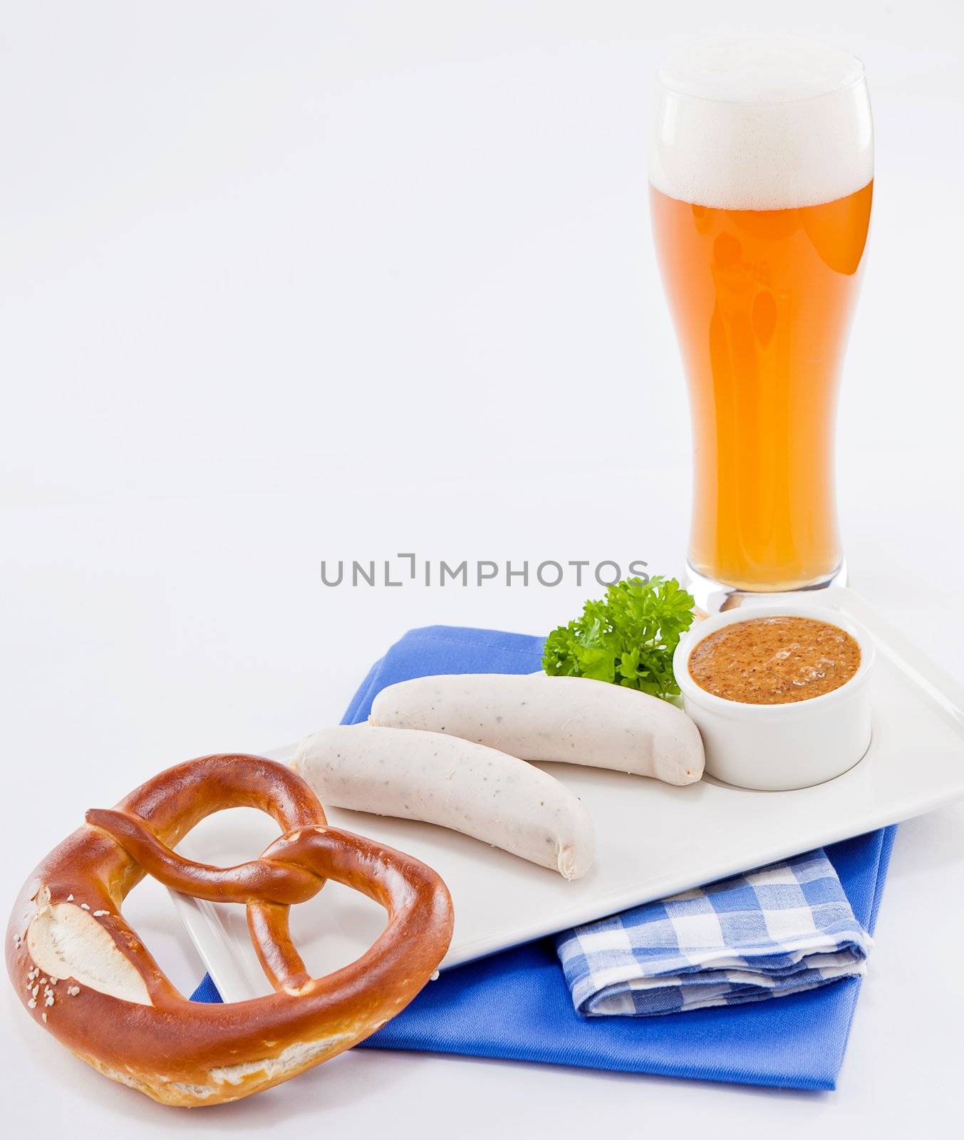 weisswurst white sausages and sweet mustard with pretzel  bavarian traditional food