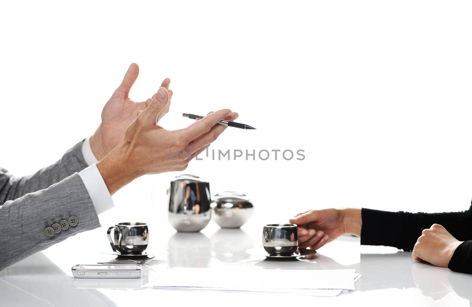 businesspeople working and drinking coffee, Closeup of hands by stokkete