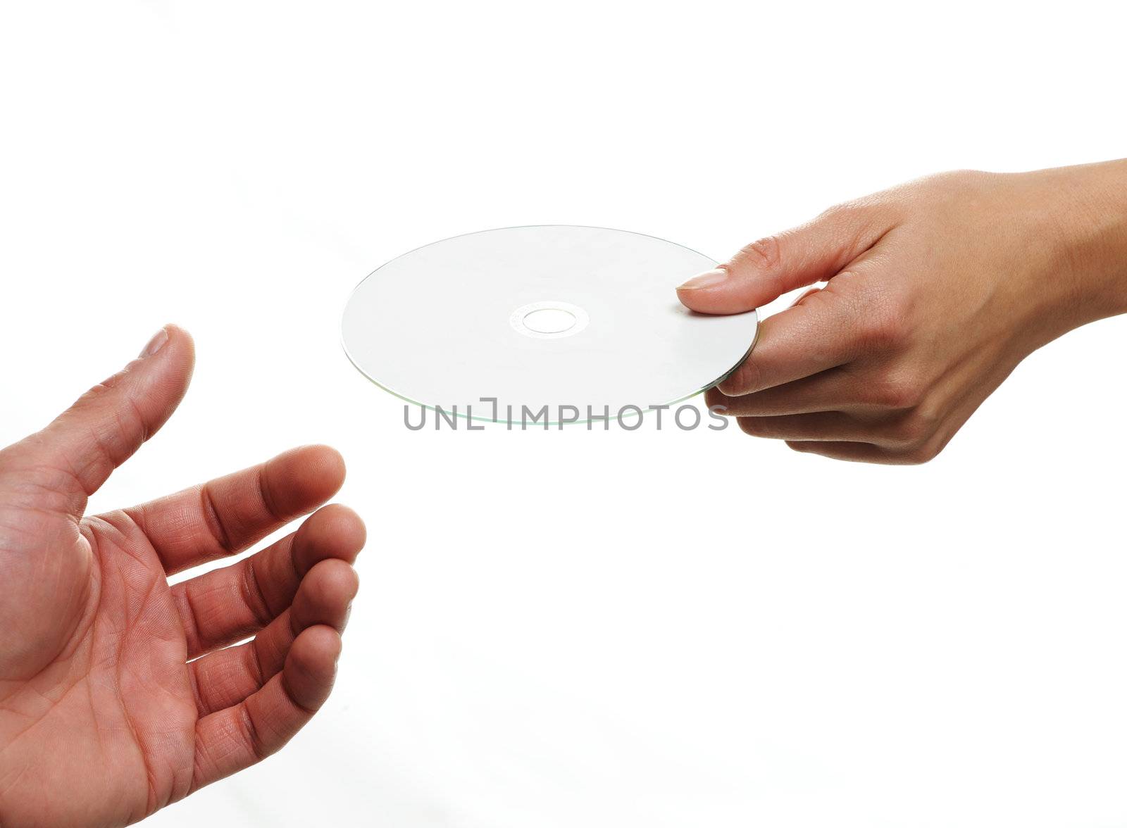 Female hand holding a blank disc, white background