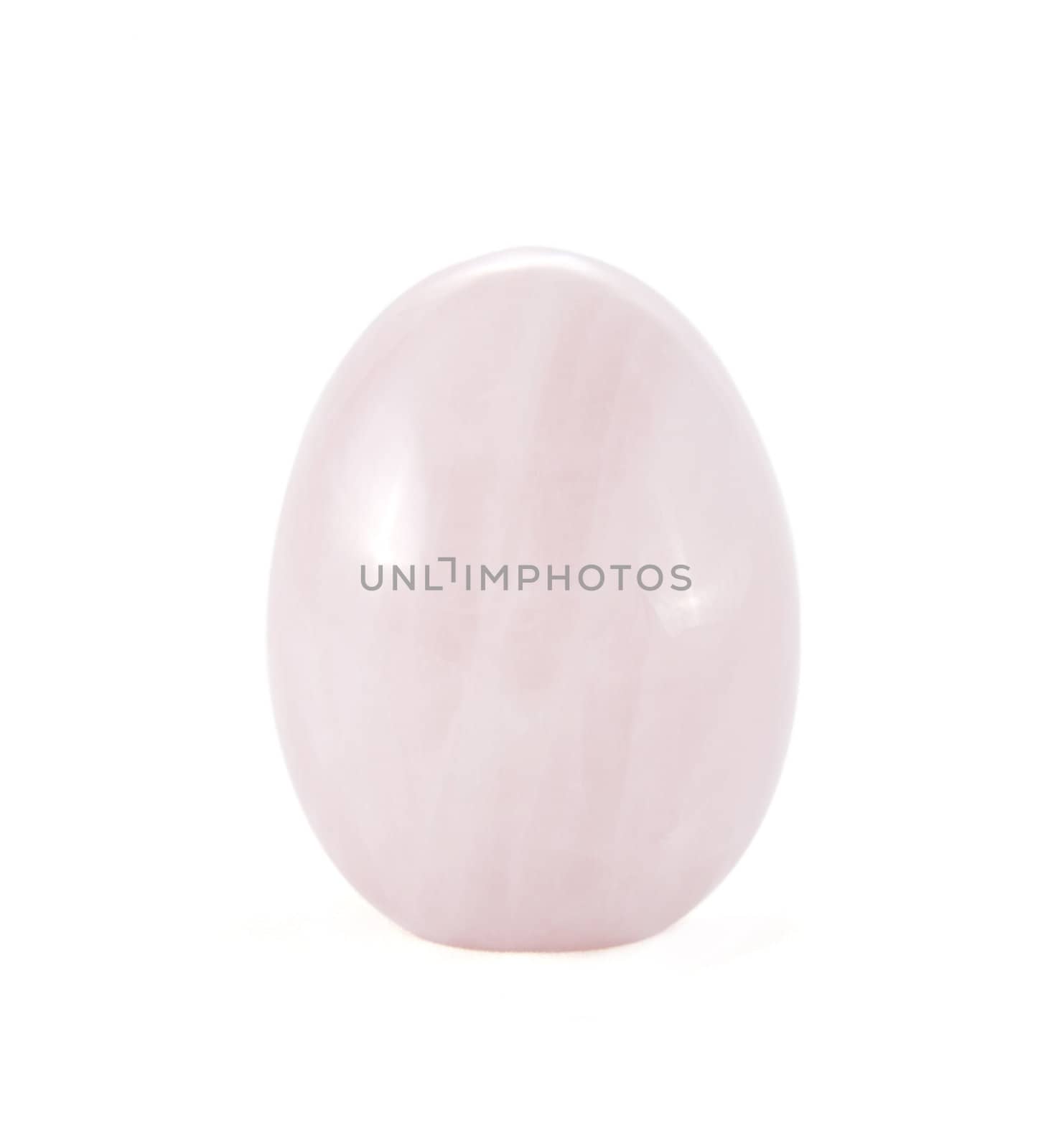 pink Quartz in the form of egg on light background