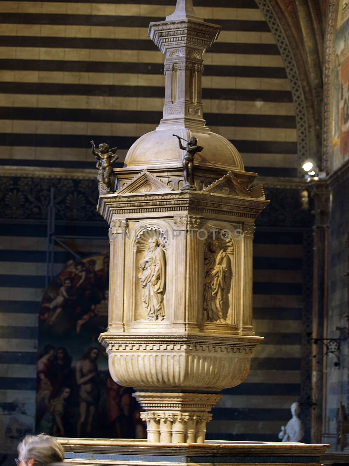 Siena - baptismal font situated in the central place of the Baptistery
