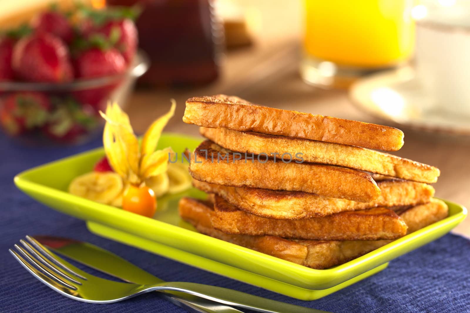 French toast with fruits (Selective Focus, Focus on the front of the upper slice) 