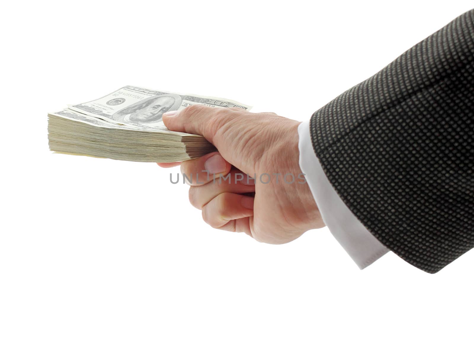 hand of businessman holding pile of dollars