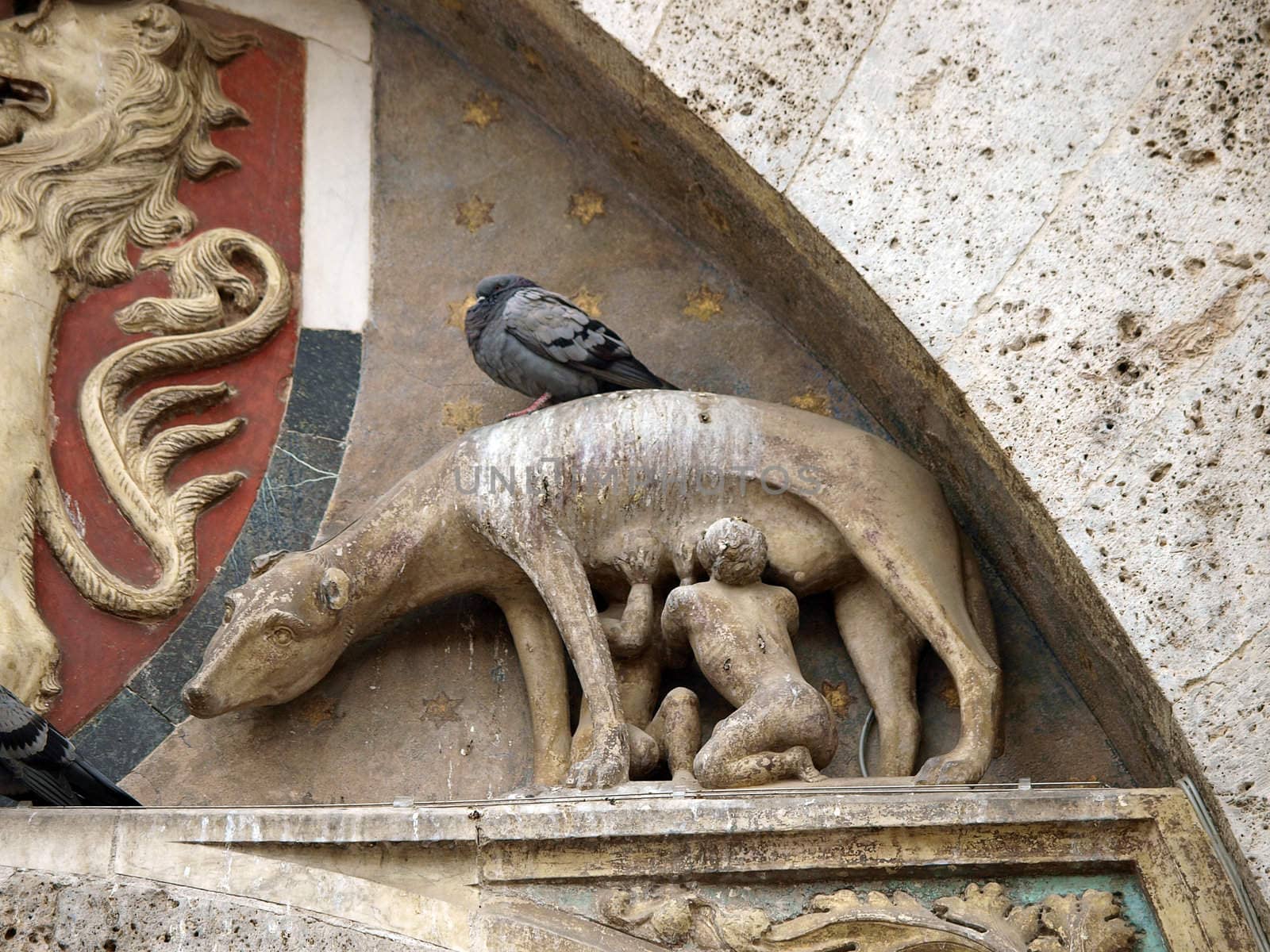 Siena - the town's emblem; a she-wolf suckling the infants Romulus and Remus.