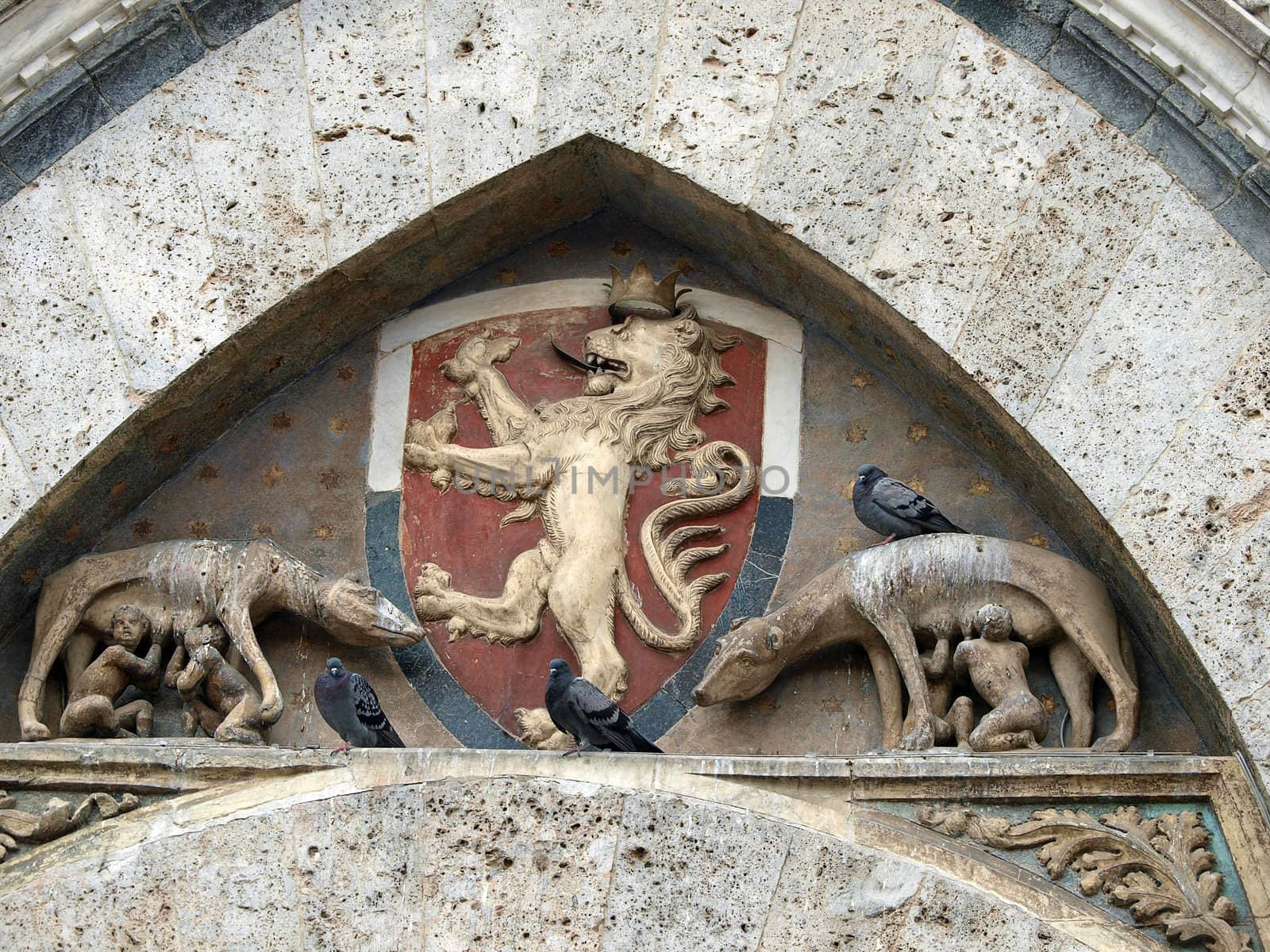 Siena - the town's emblem; a she-wolf suckling the infants Romulus and Remus.