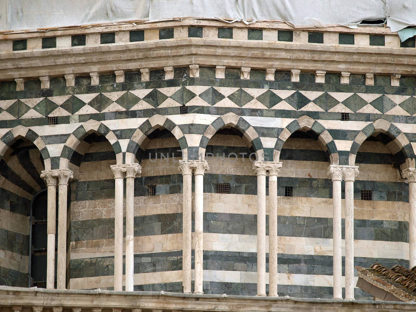 Architectural details of  cathedral in medieval town Siena,Tuscany,Italy. The Duomo of Siena, which was built in the 12th and 13th centuries, is one of the prettiest churches in Gothic style in Italy