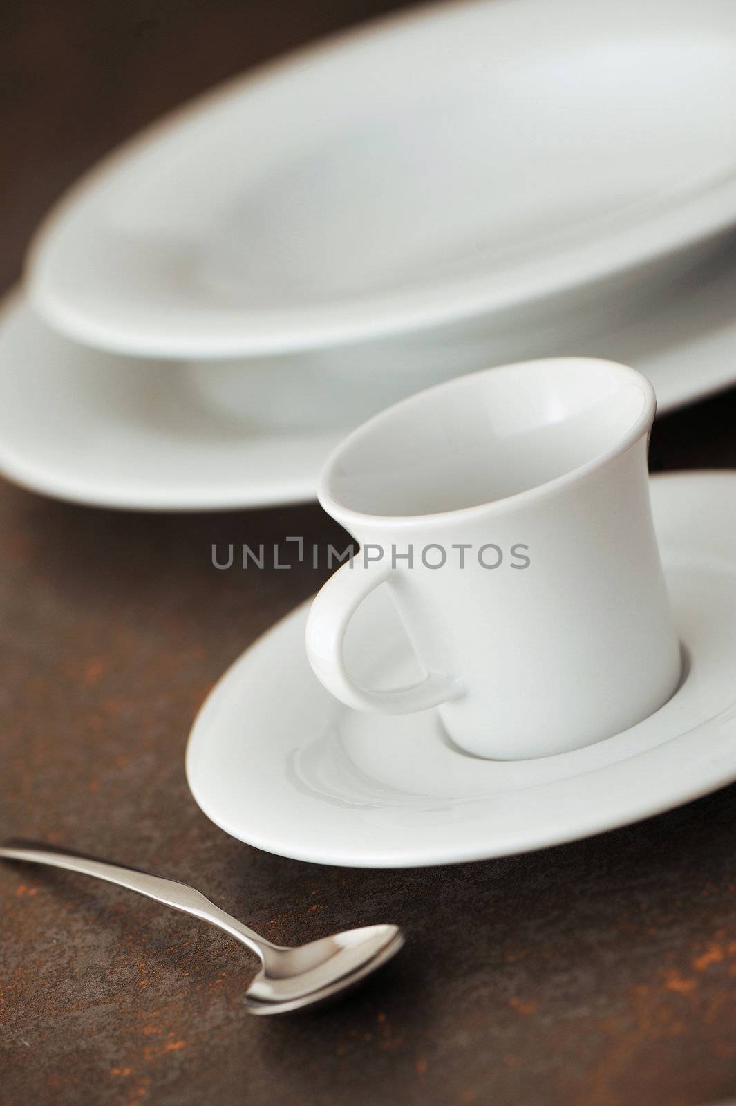 Place setting in a restaurant, close-up soft focus