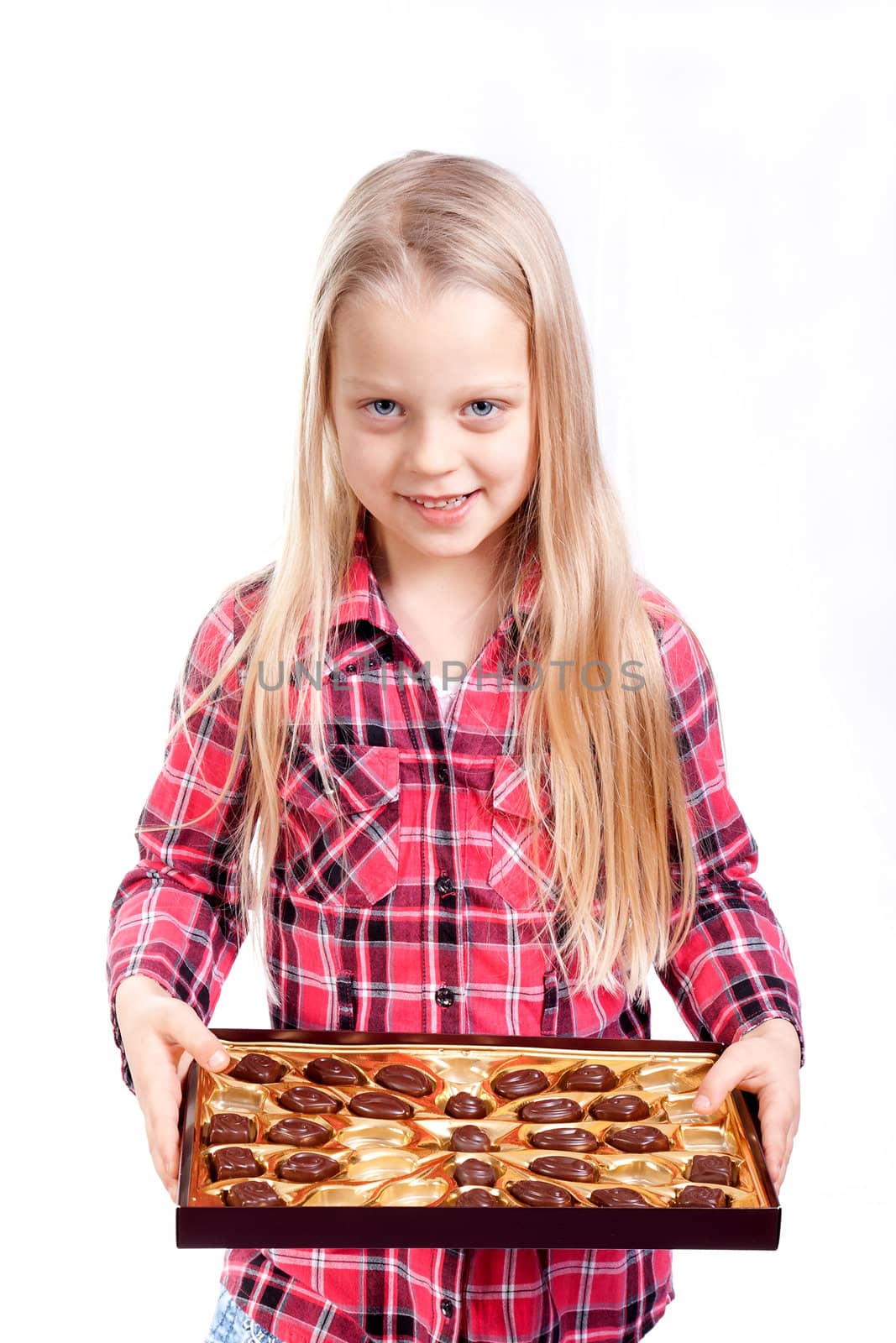 little girl holding candy box over white background