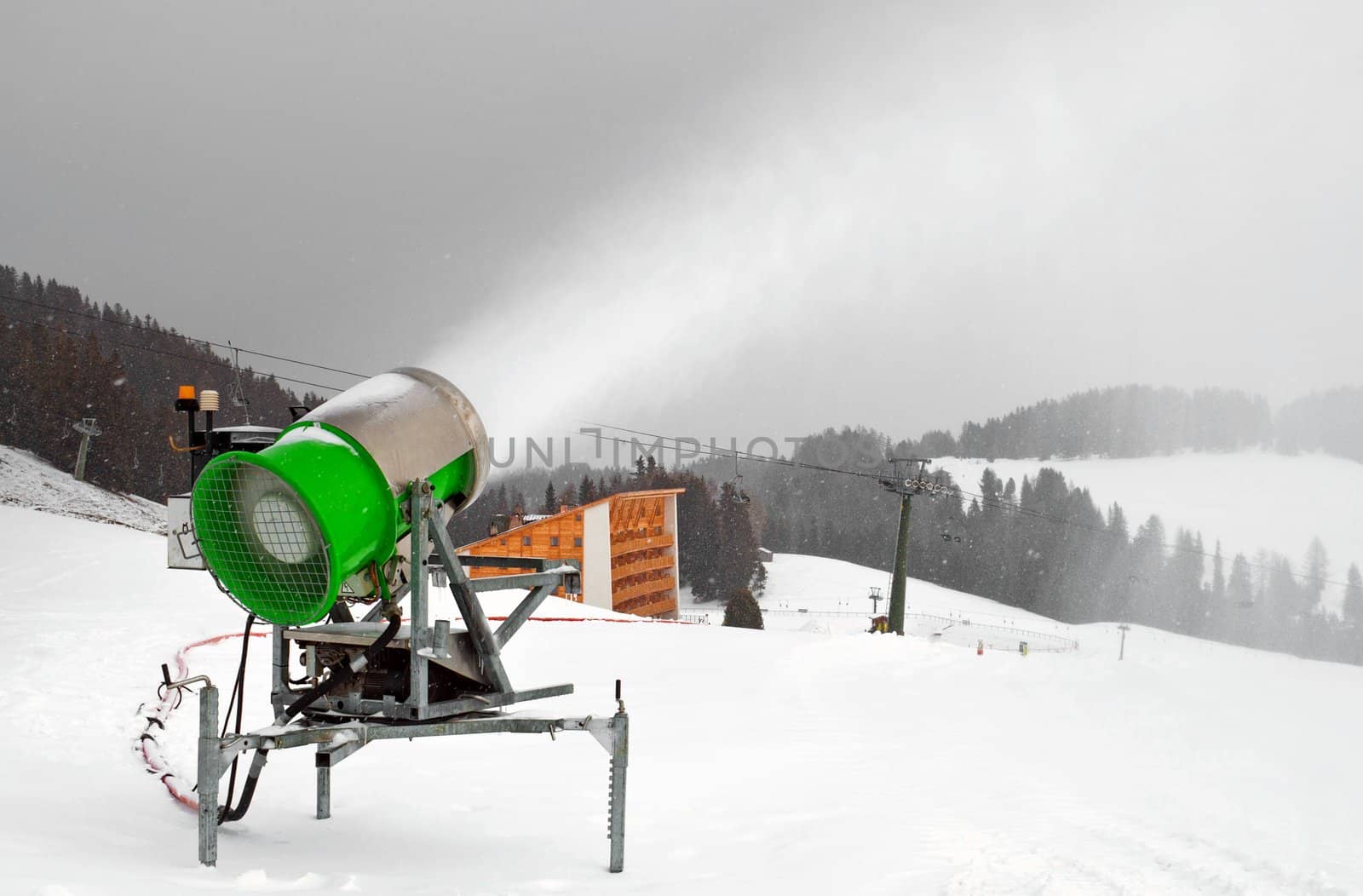 active artificial snow cannon on Dolomiti, Italian Alps, Ortisei