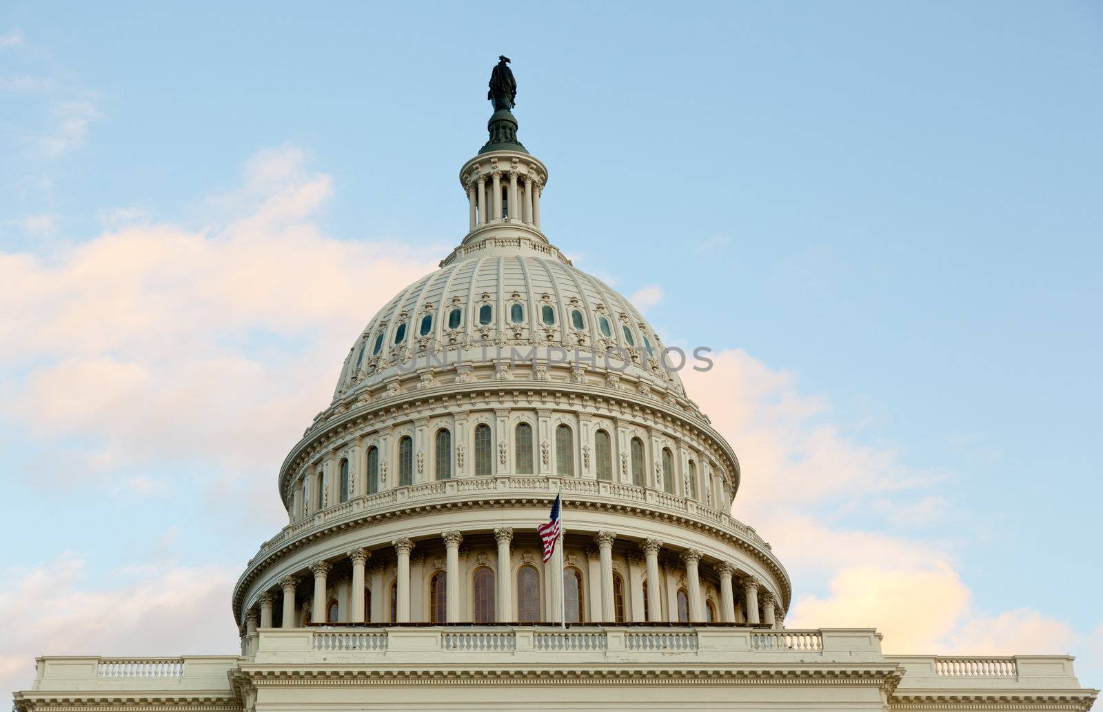 US flag flies in front of the US Capitol in Washington DC