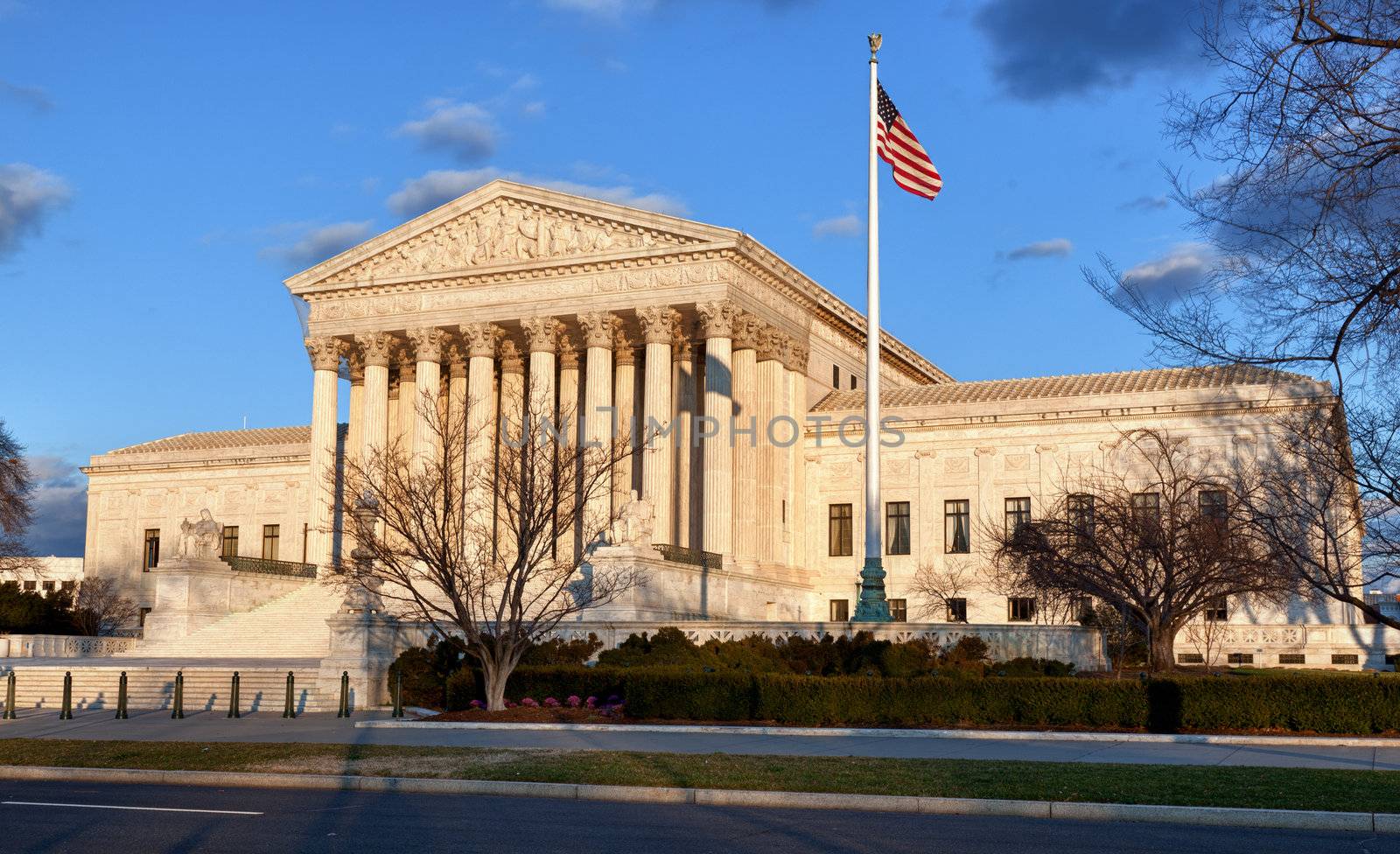 Late afternoon winter sun illuminates front of supreme court in Washington in winter
