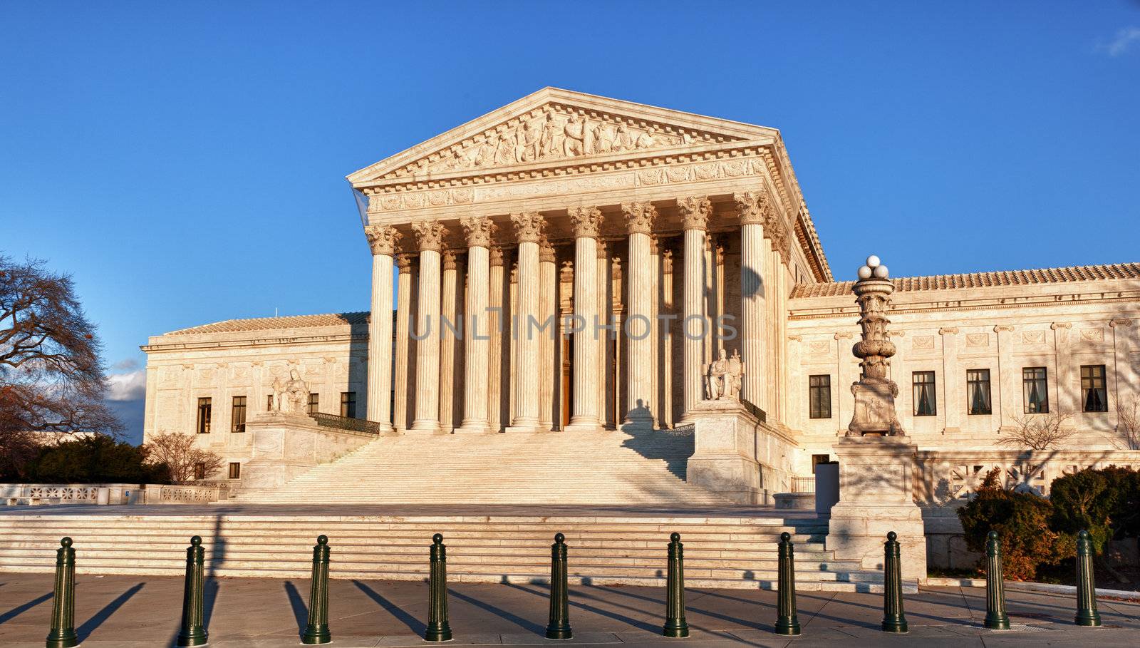 Late afternoon winter sun illuminates front of supreme court in Washington in winter