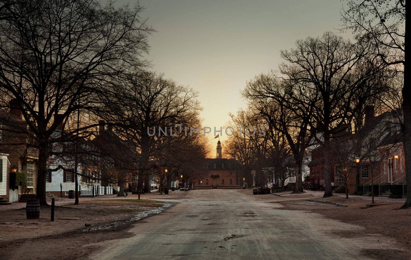 WILLIAMSBURG, VIRGINIA - DECEMBER 30: Sun rises over the Capitol on December 30, 2011. Colonial Williamsburg's 301 acres includes many restored buildings and houses