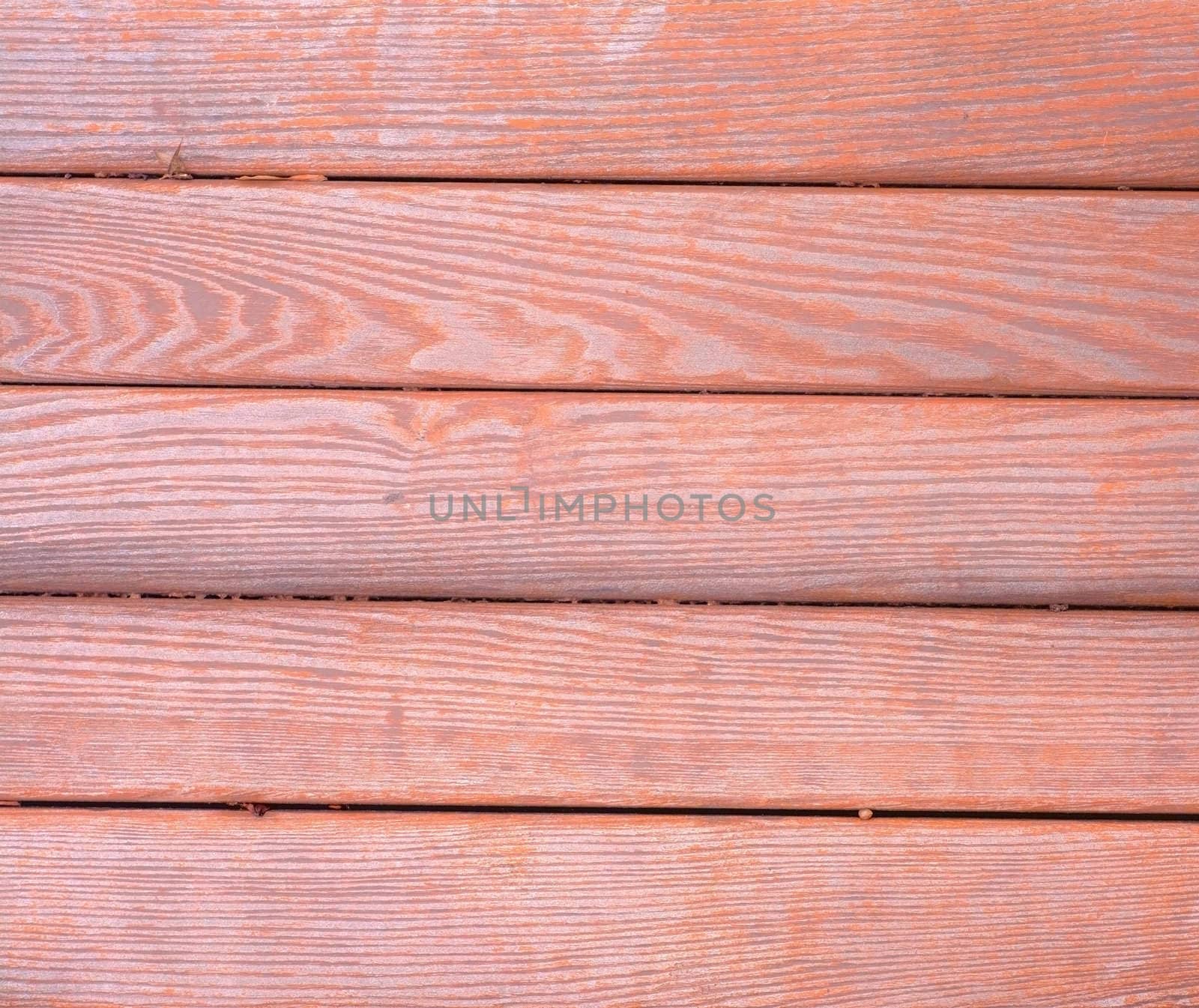 General view of the texture of planks red-brown color