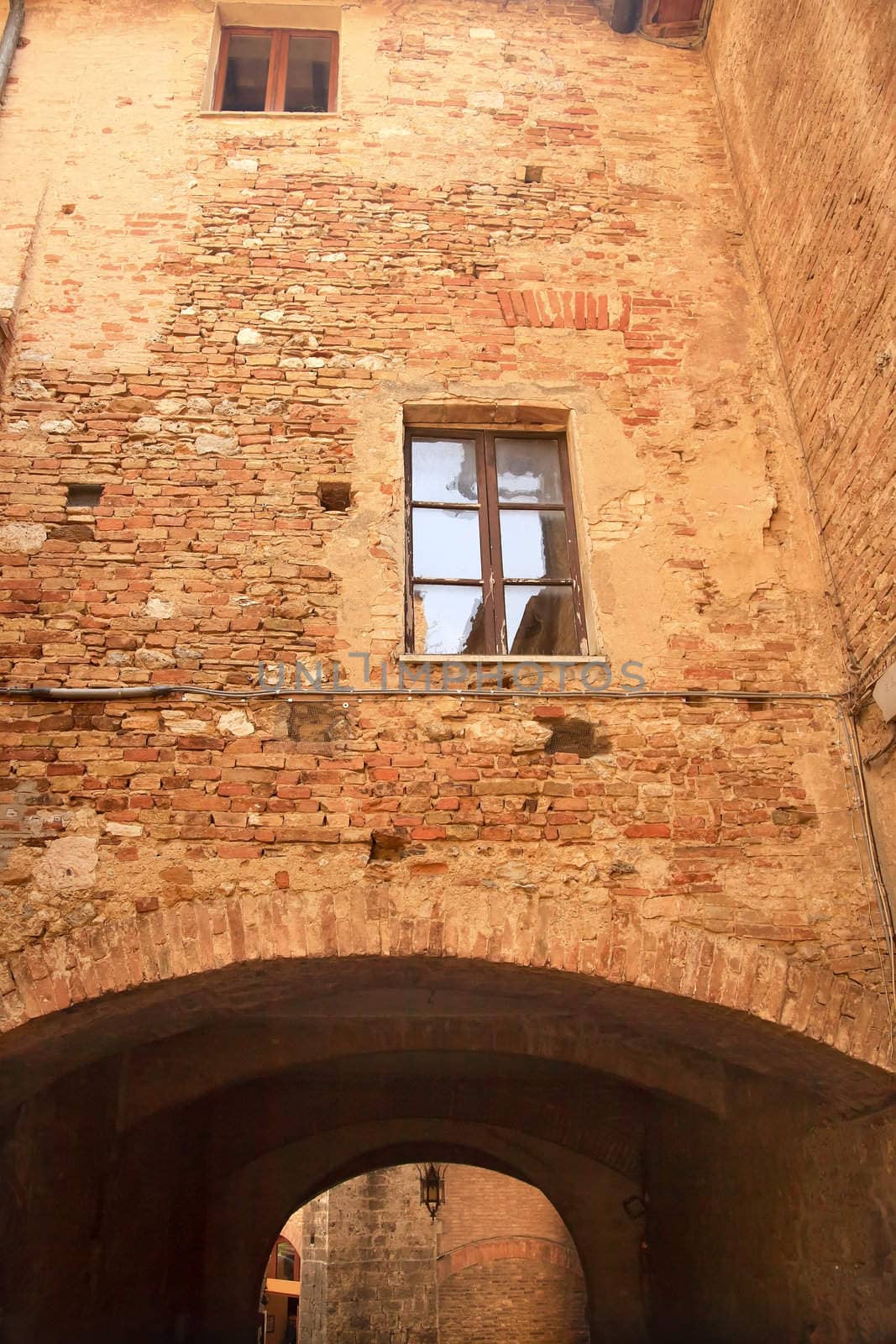 Ancient Stone Arch Medieval Town Street San Gimignano Tuscany Italy