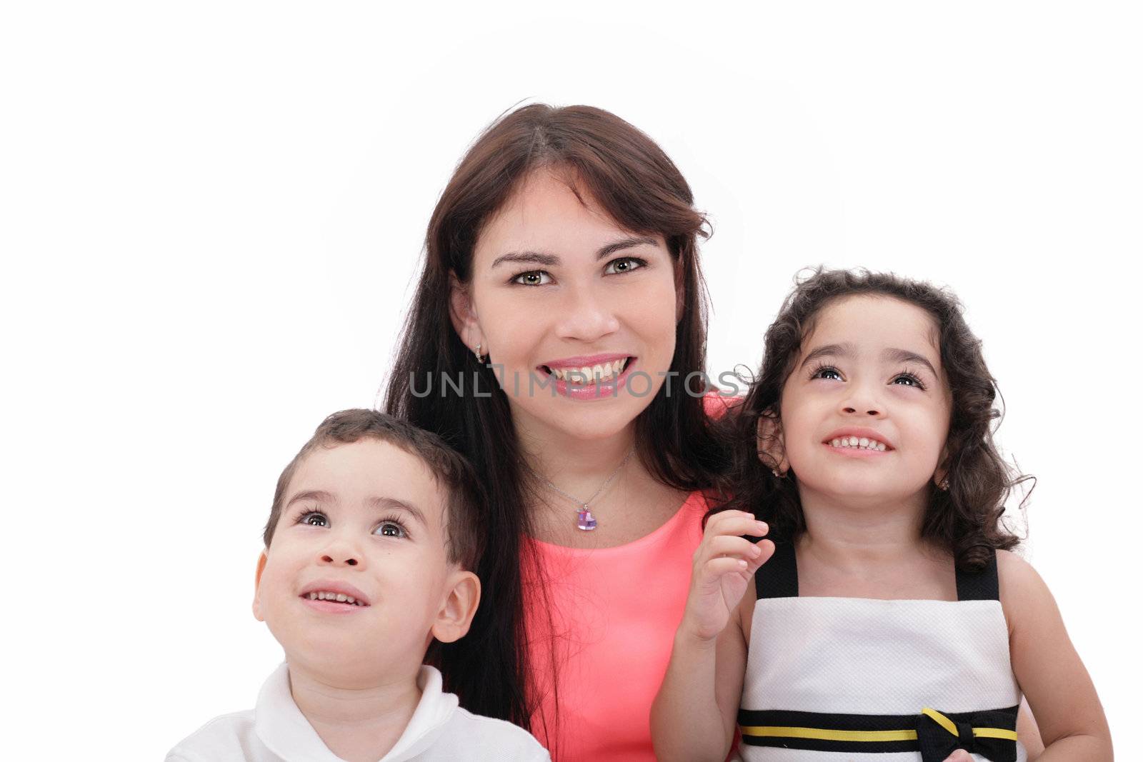 Mother, son and daughter in a happy embrace on a white background.