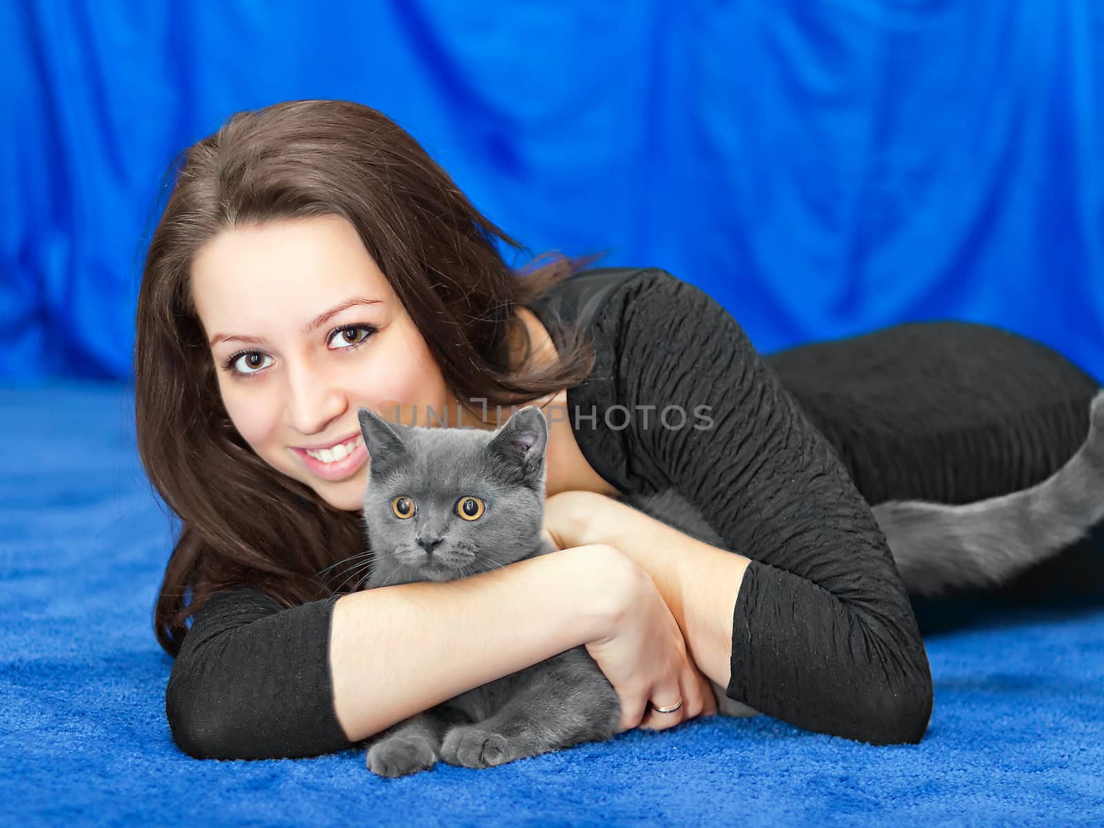 beautiful girl with a cat on hands by Plus69