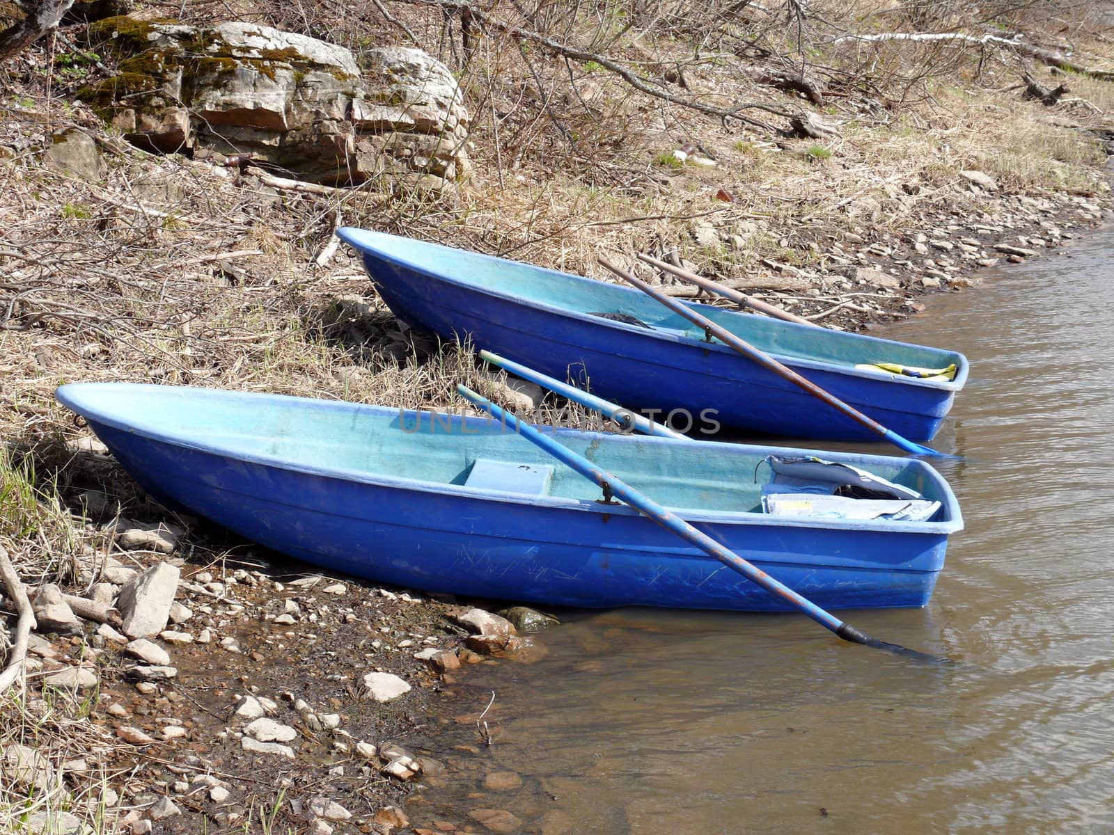 Two boats in stone coast. Satka river, Russia