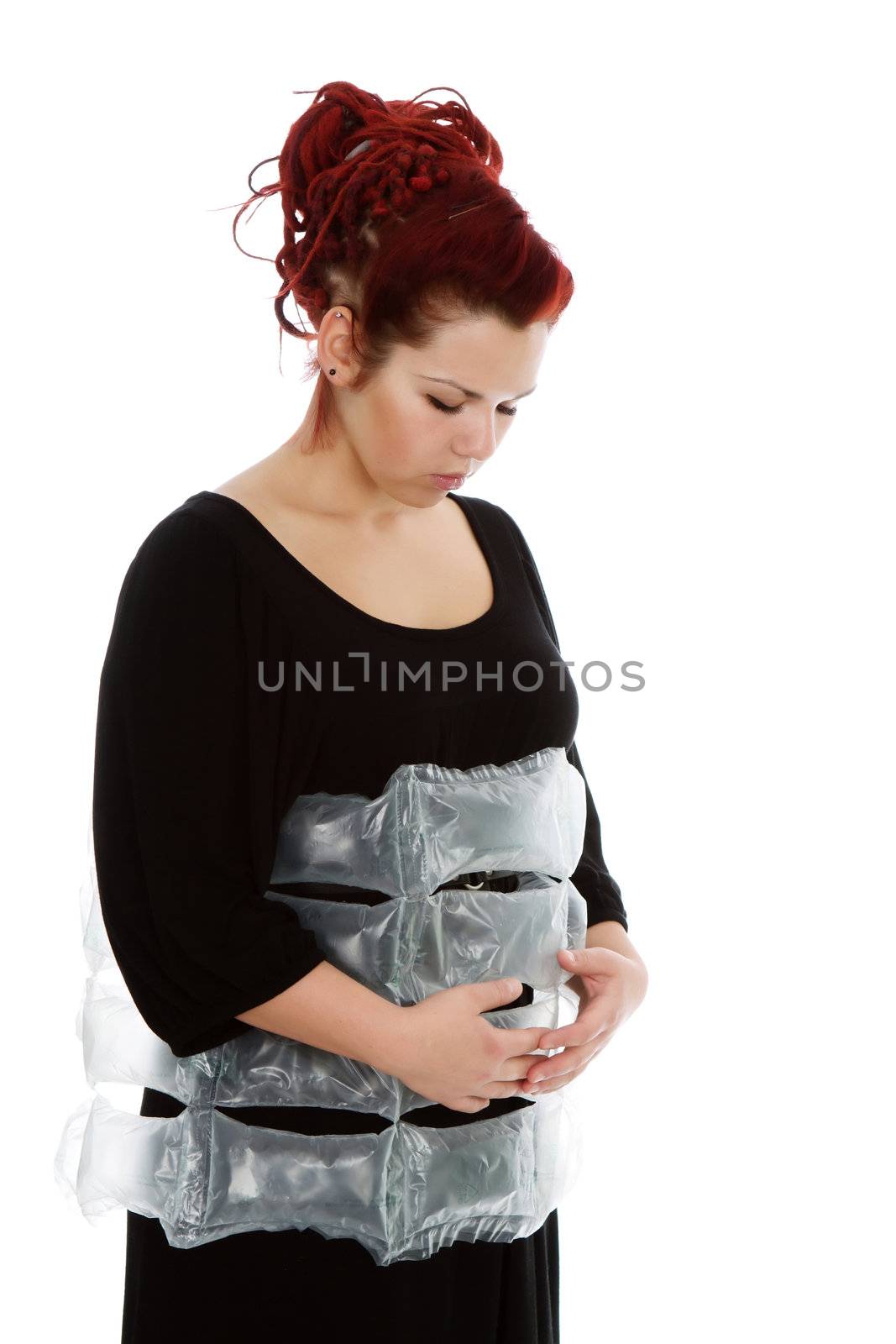 Modern red-haired girl with the air bags isolated on white background
