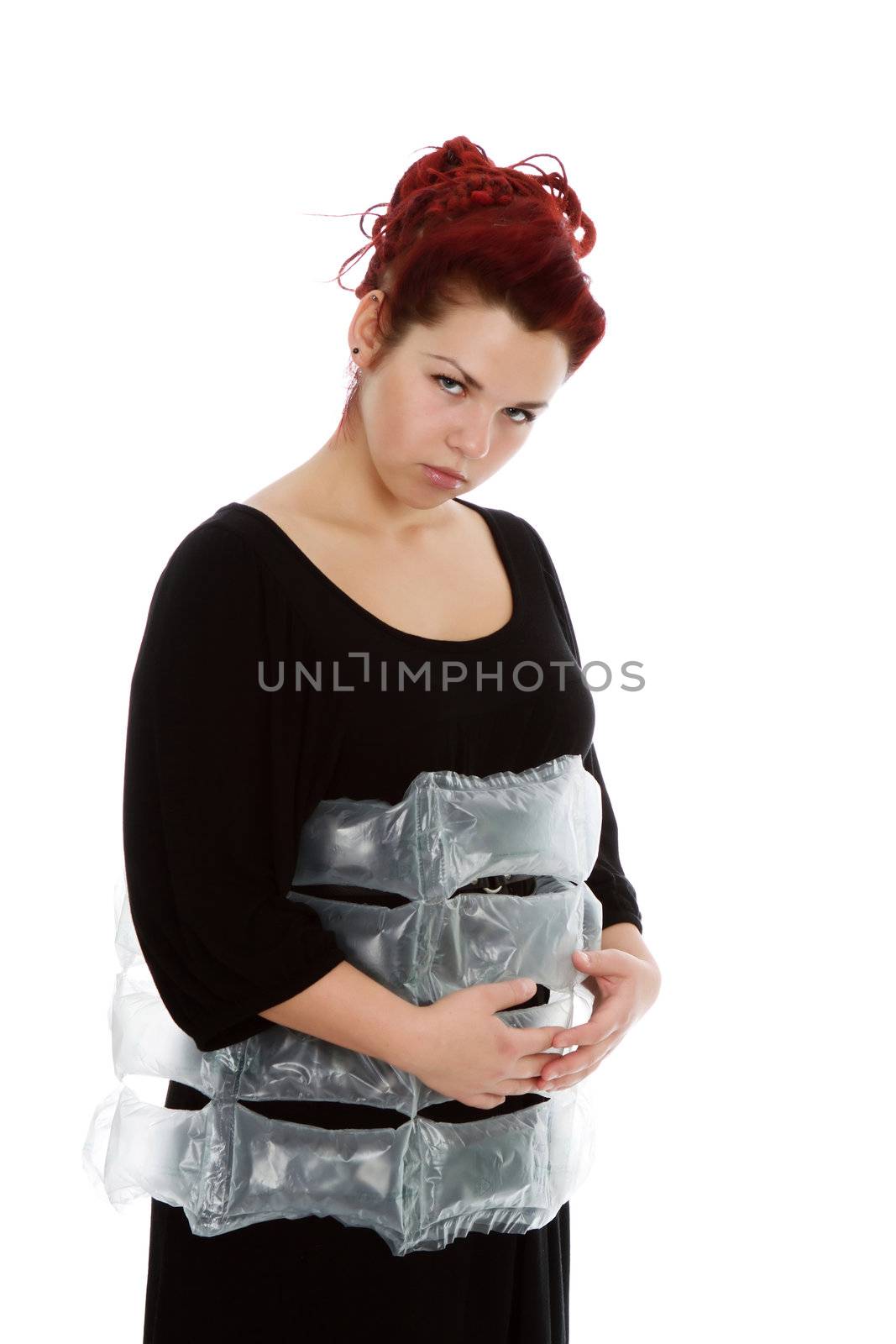 Modern red-haired girl with the air bags isolated on white background
