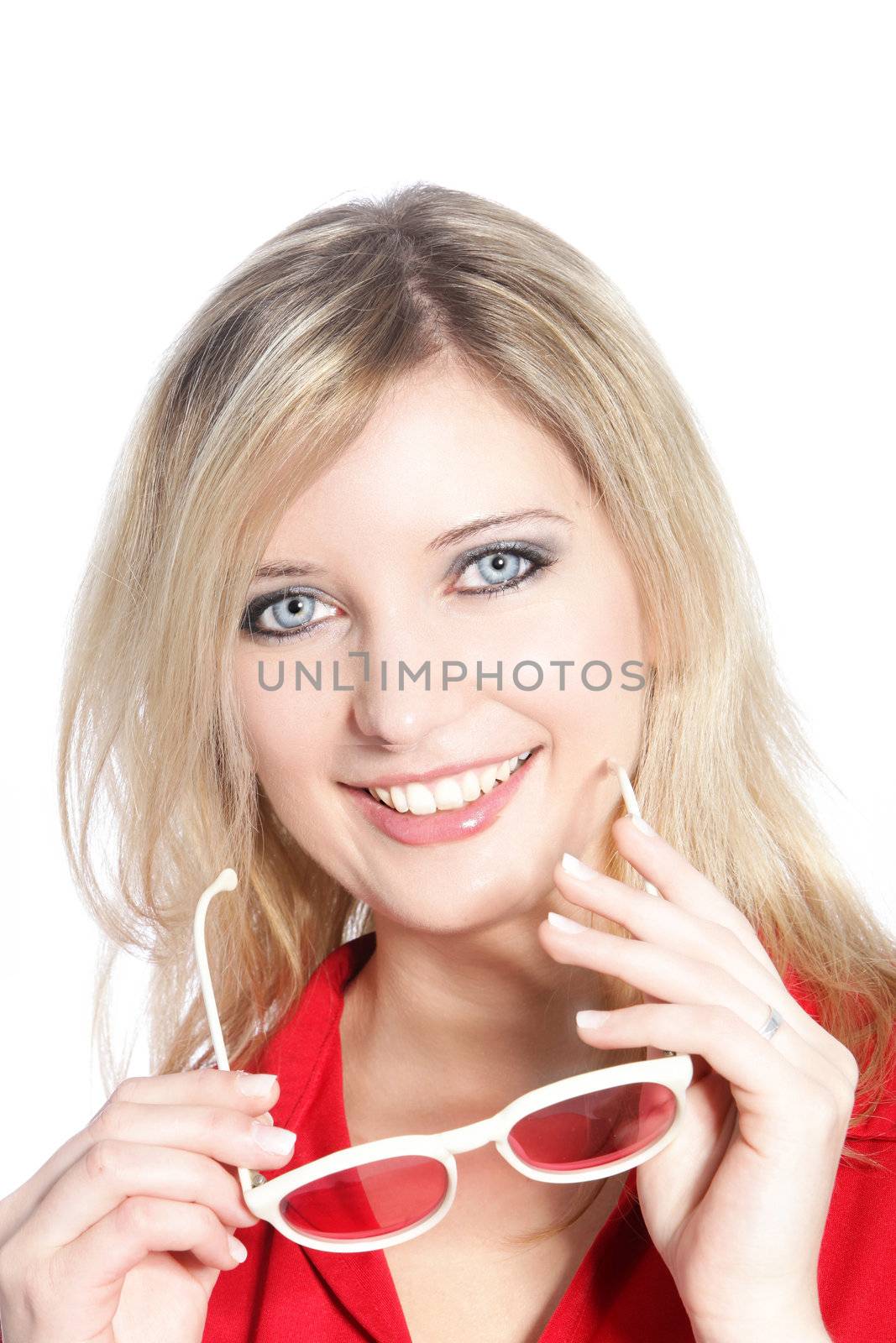 Portrait of Beautiful Caucasian woman holding sunglasses