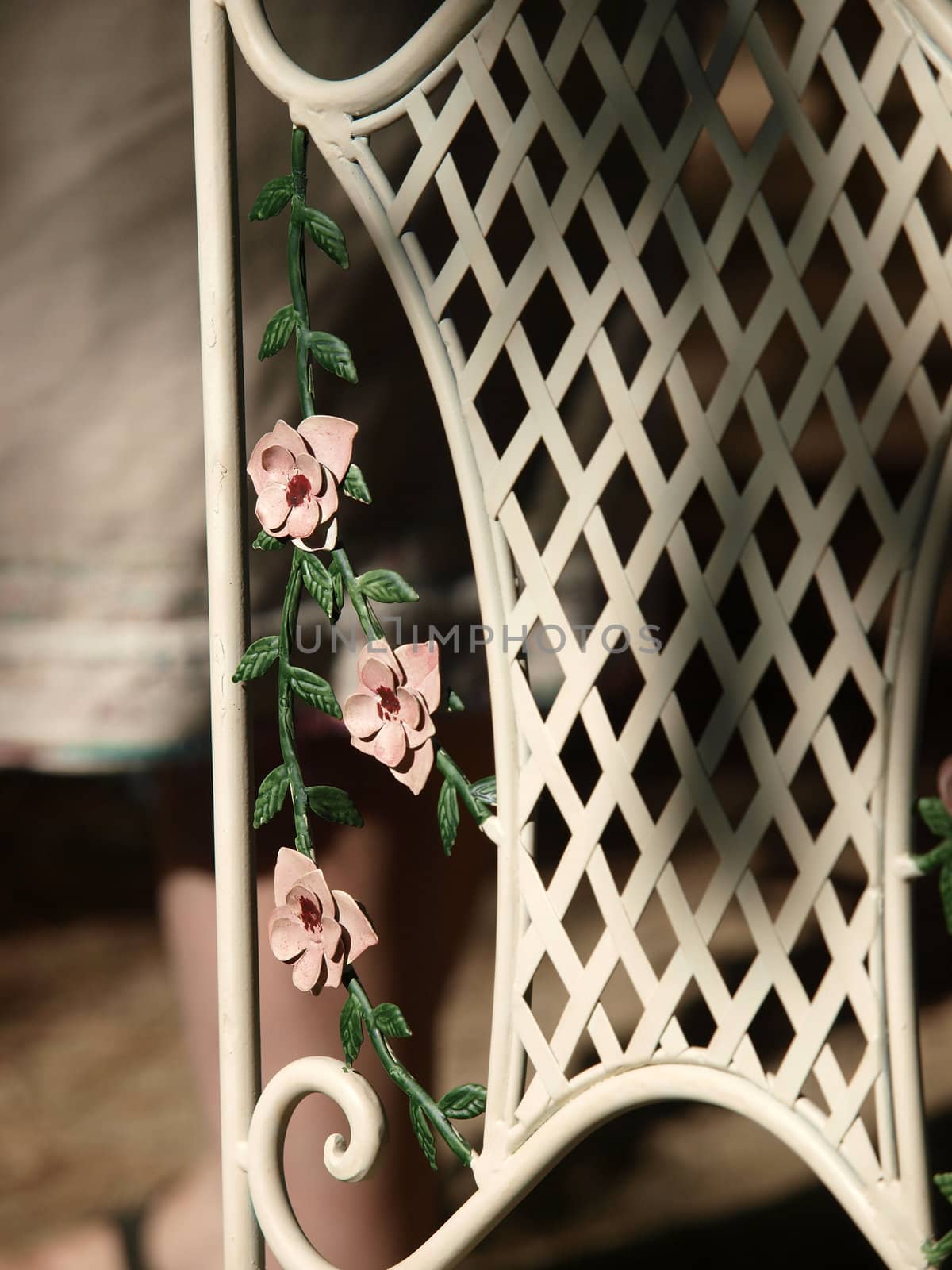 metal chair with flower motif