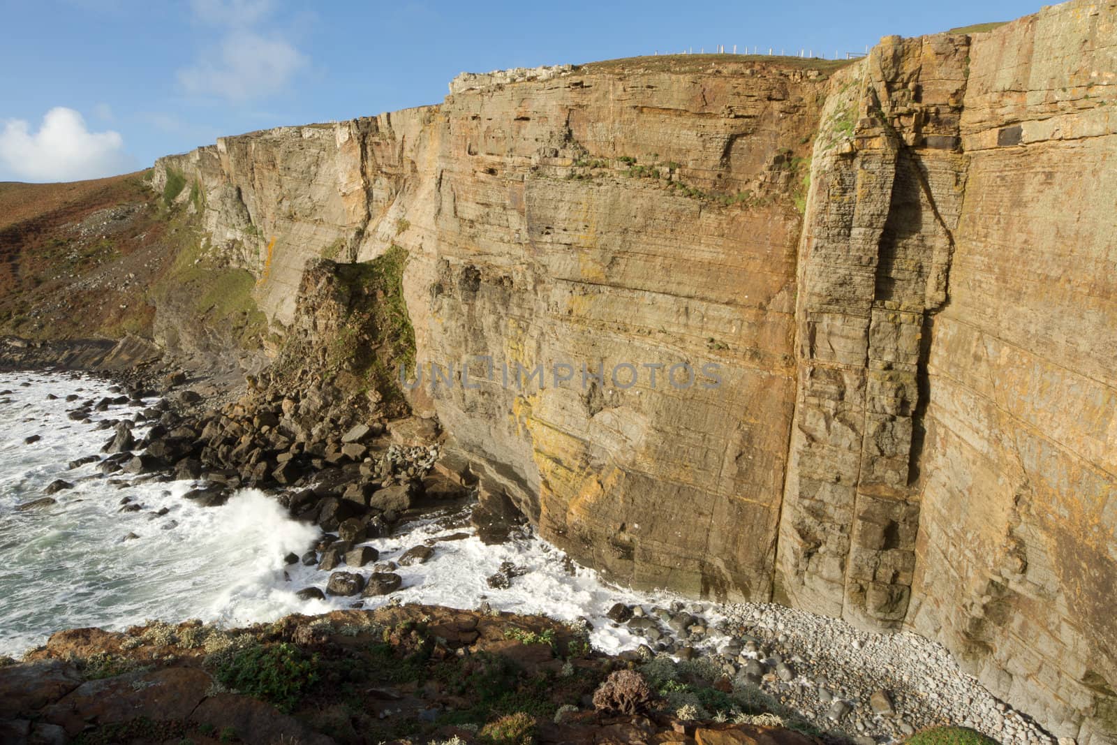 The large shale cliffs of Craig Dorys on Cilan Head near Abersoch, Lleyn Peninsular, North Wales, UK. A popular venue for rock climbers, geologists and tourists walking the North Wales coast path.